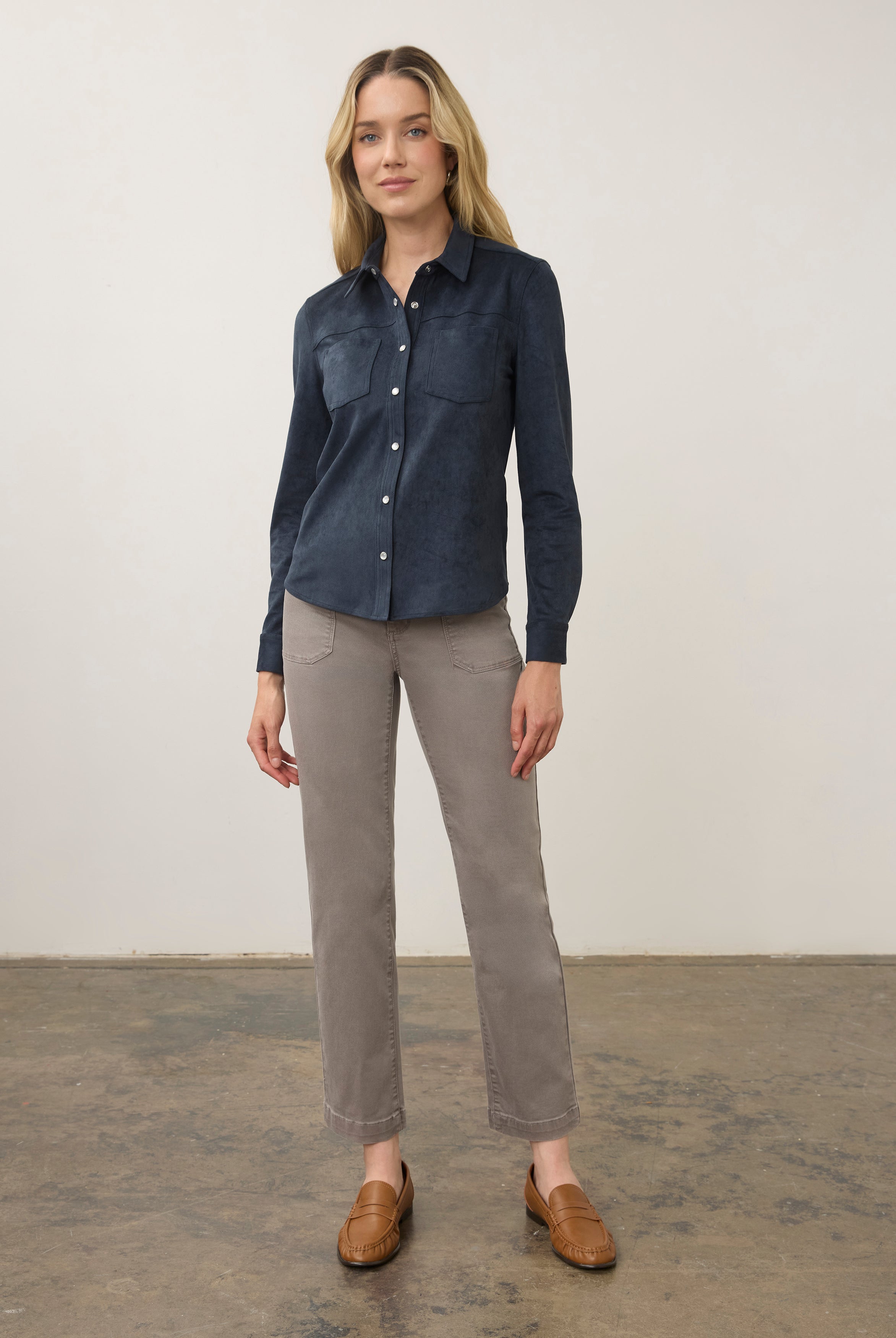 Model in navy suede shirt and grey pants, full body view by French Dressing Jeans (FDJ)