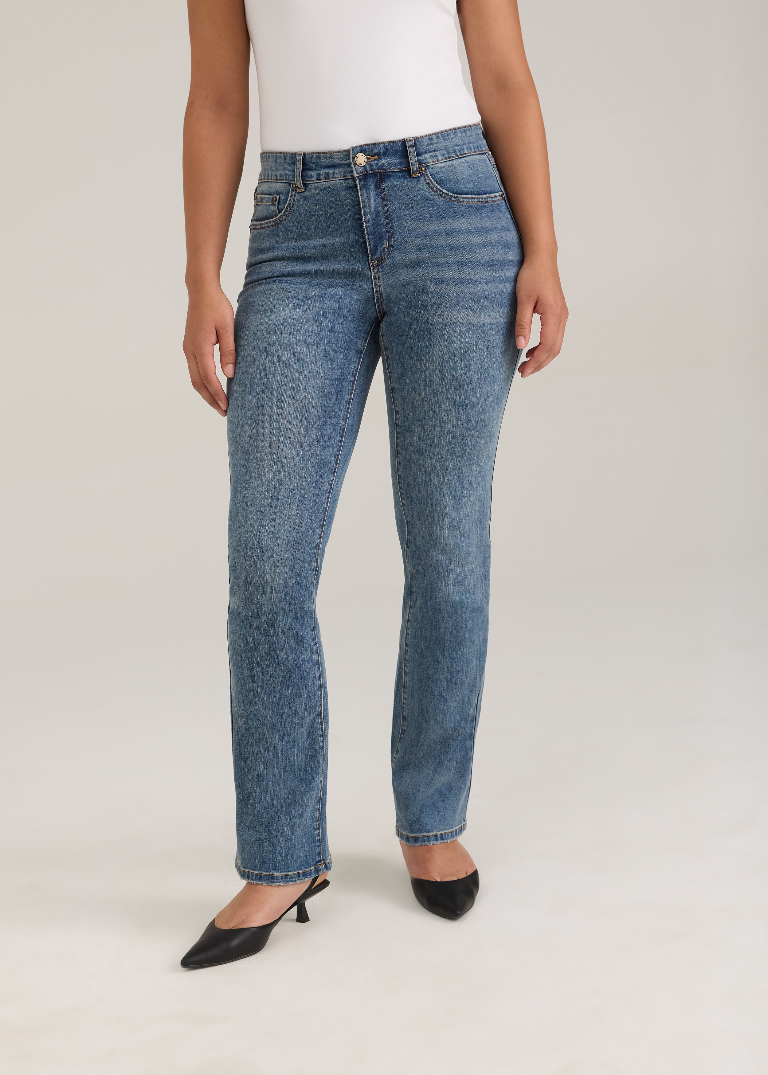 Front view of light wash slim leg jeans with elegant high-rise by French Dressing Jeans (FDJ)