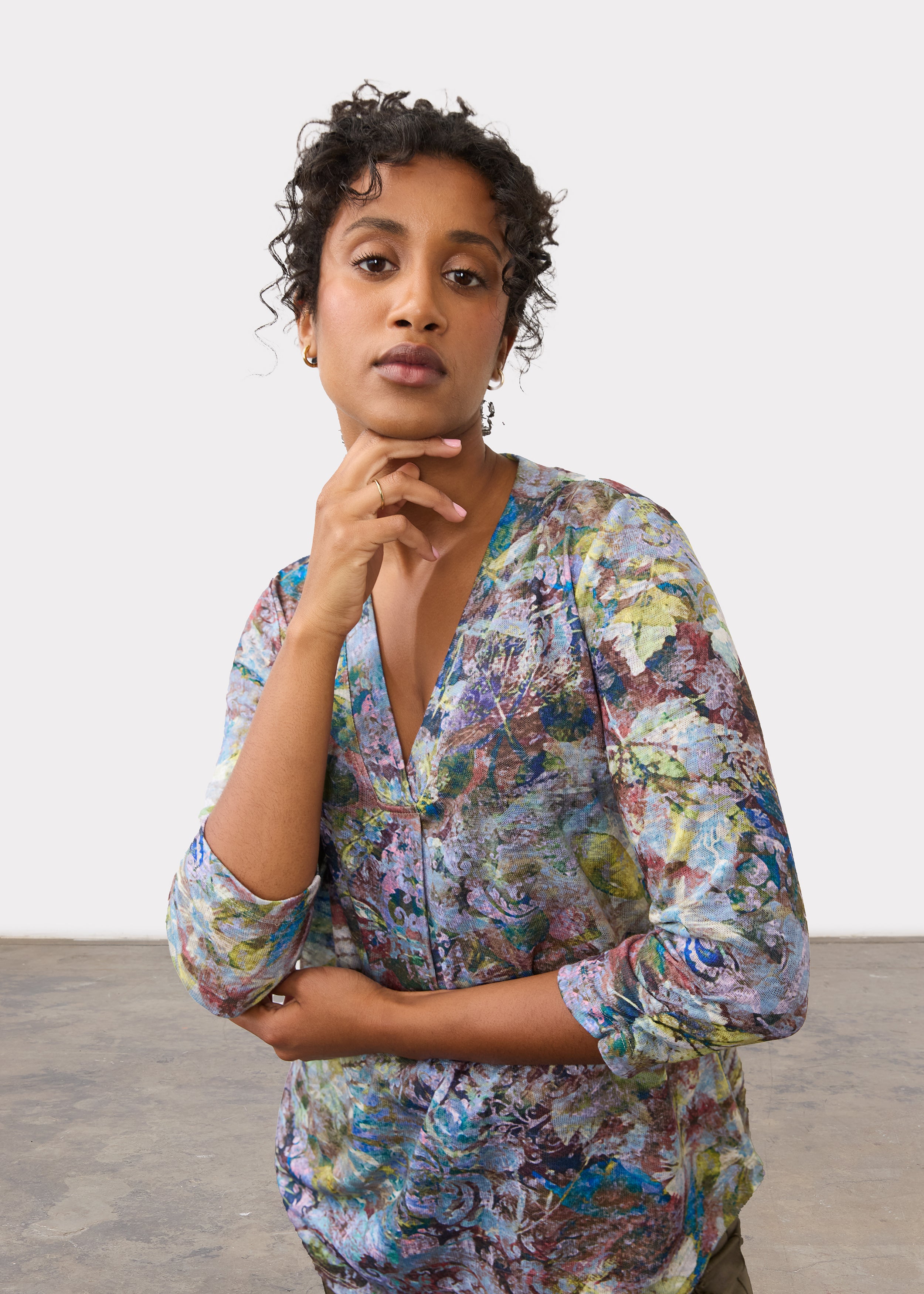 Close-up of 3/4 sleeve V-neck top showing intricate Renaissance Bouquet print and soft drape by French Dressing Jeans (FDJ)