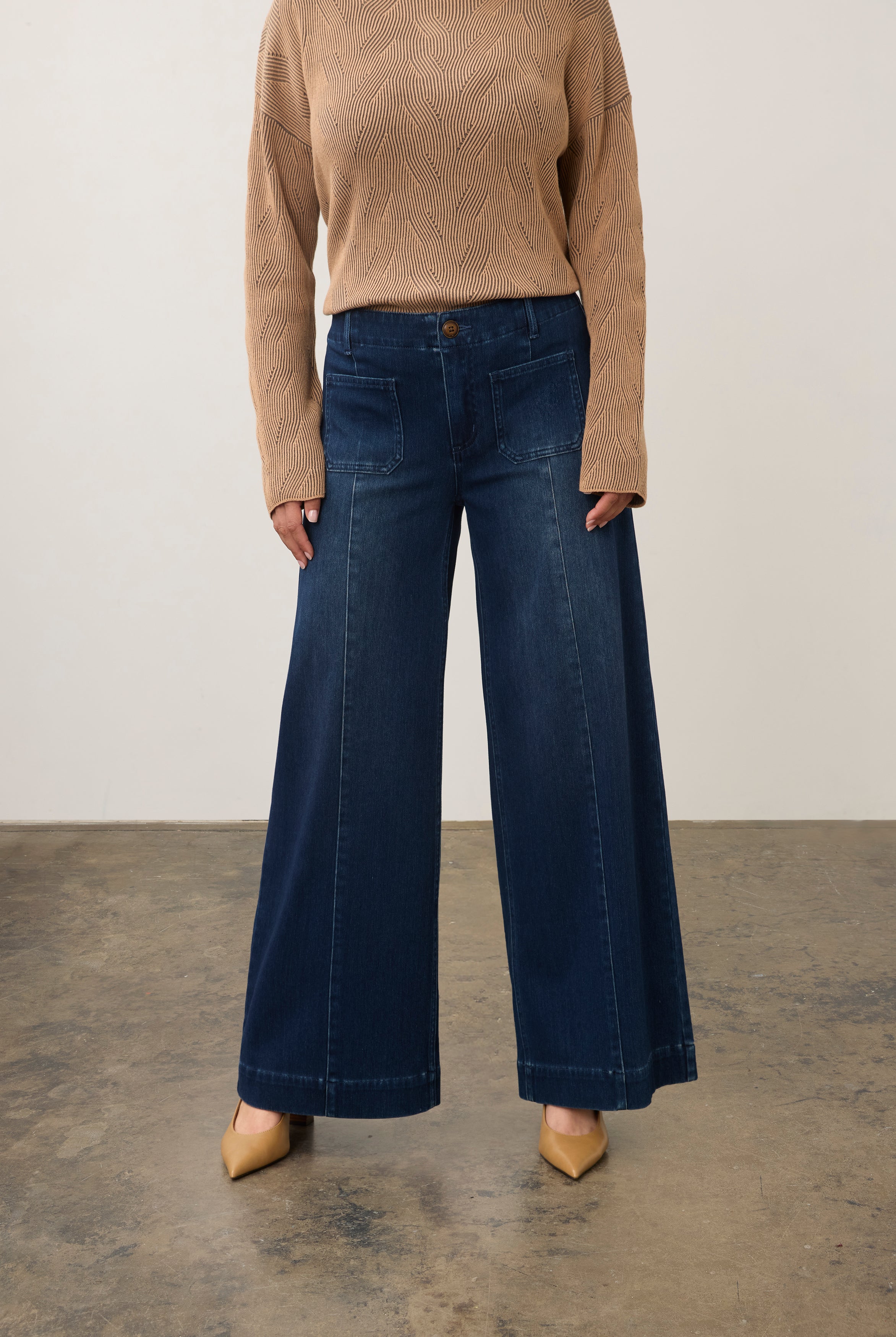 Front view of dark rinse wide-leg jeans with front patch pockets by French Dressing Jeans (FDJ)