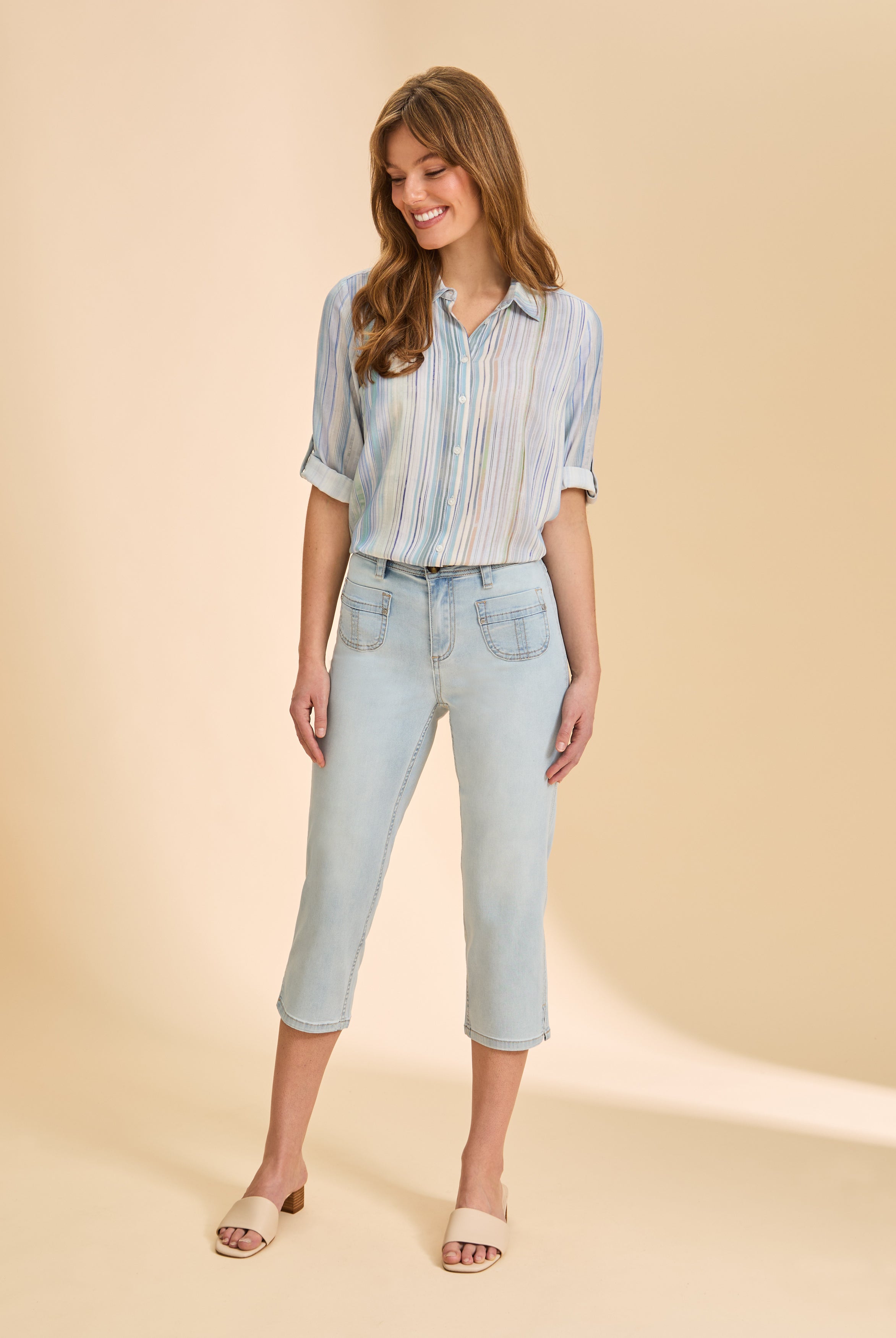 Front view of light wash cropped denim pants with patch pockets by French Dressing Jeans (FDJ)