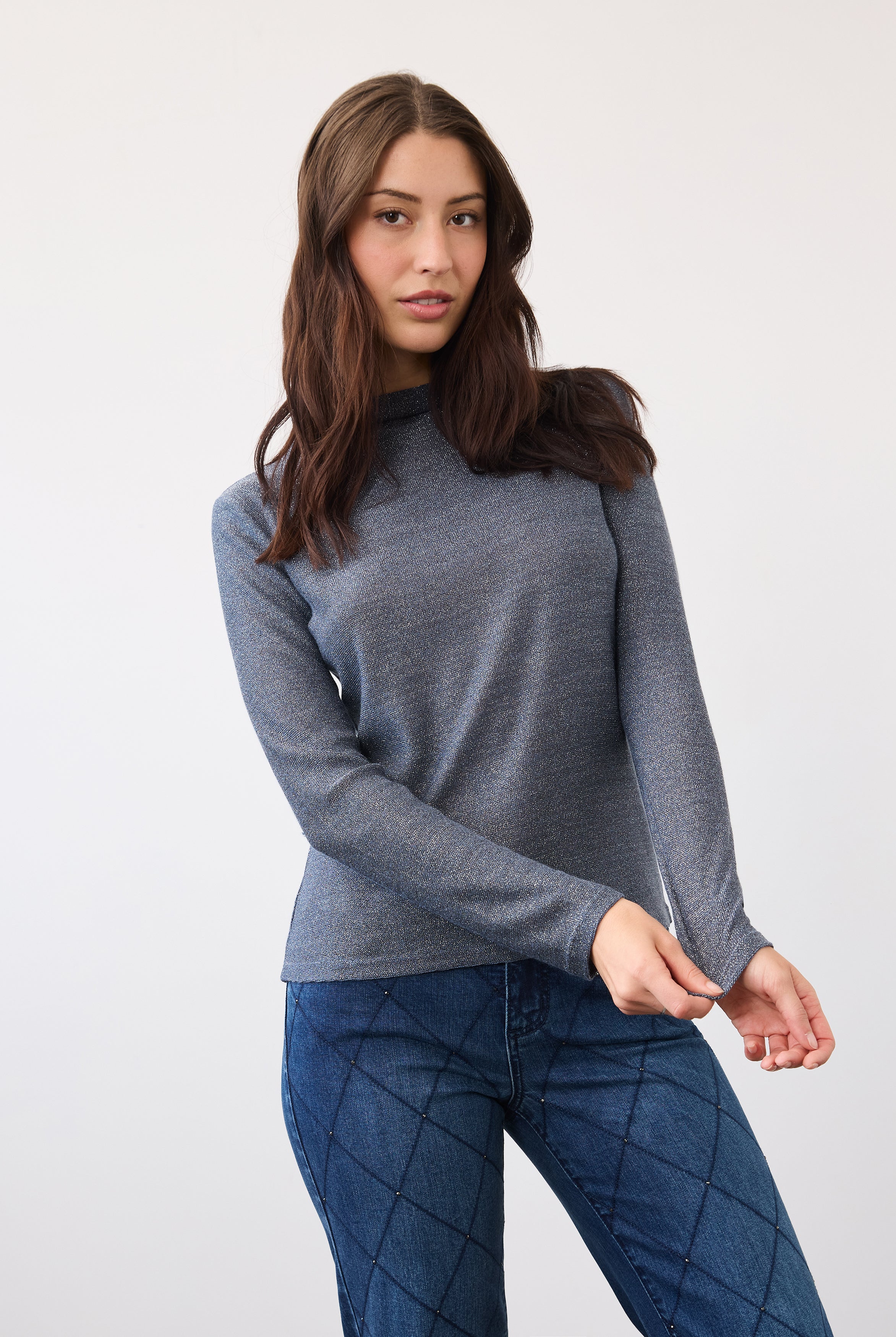 Front view of blue shimmer top with long sleeves and fitted shape by French Dressing Jeans (FDJ)