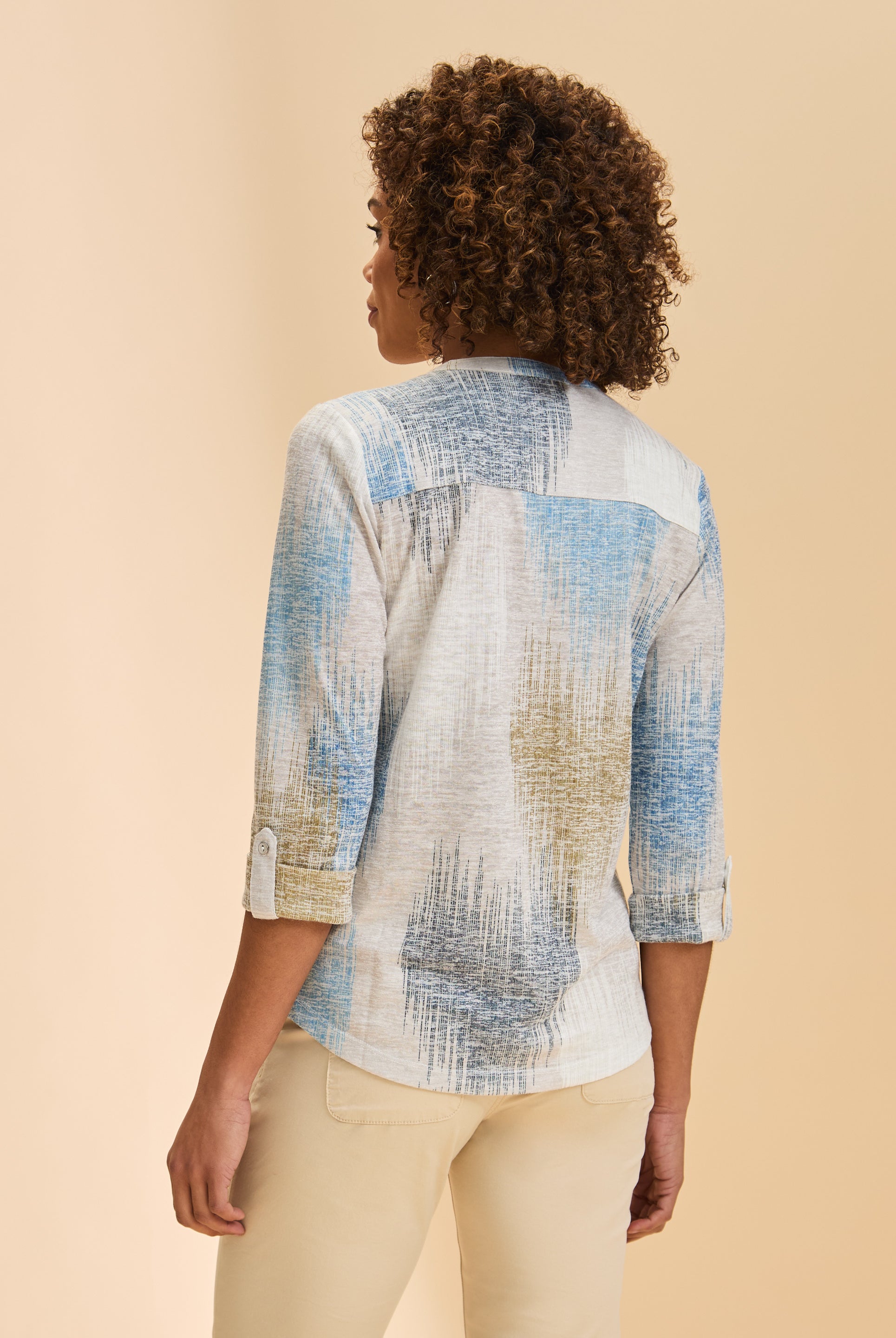 Back view of blue and beige patterned top highlighting fabric print by French Dressing Jeans (FDJ)