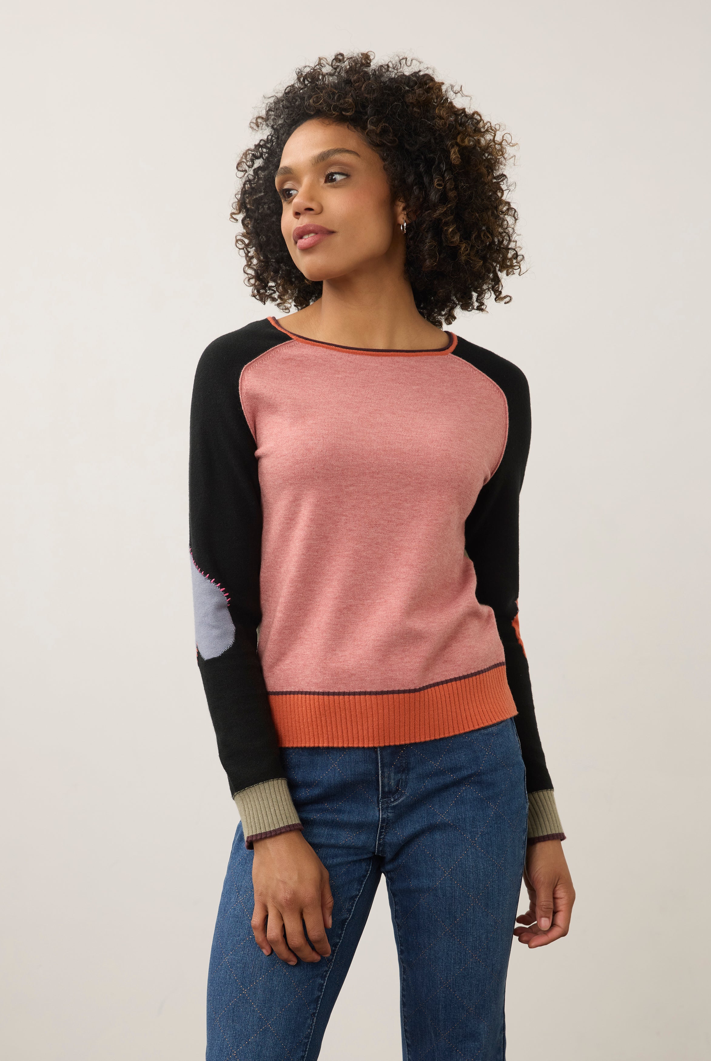 Front view of pink and black colorblock sweater with long sleeves by French Dressing Jeans (FDJ)