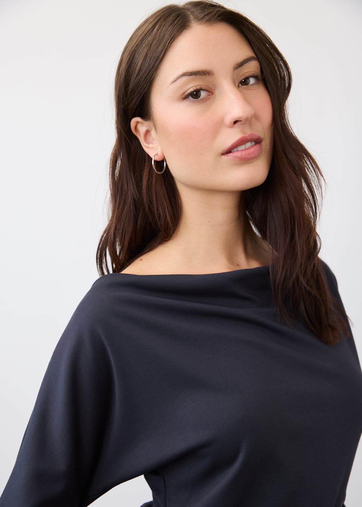 Close-up of navy top highlighting fabric drape and fit by French Dressing Jeans (FDJ)