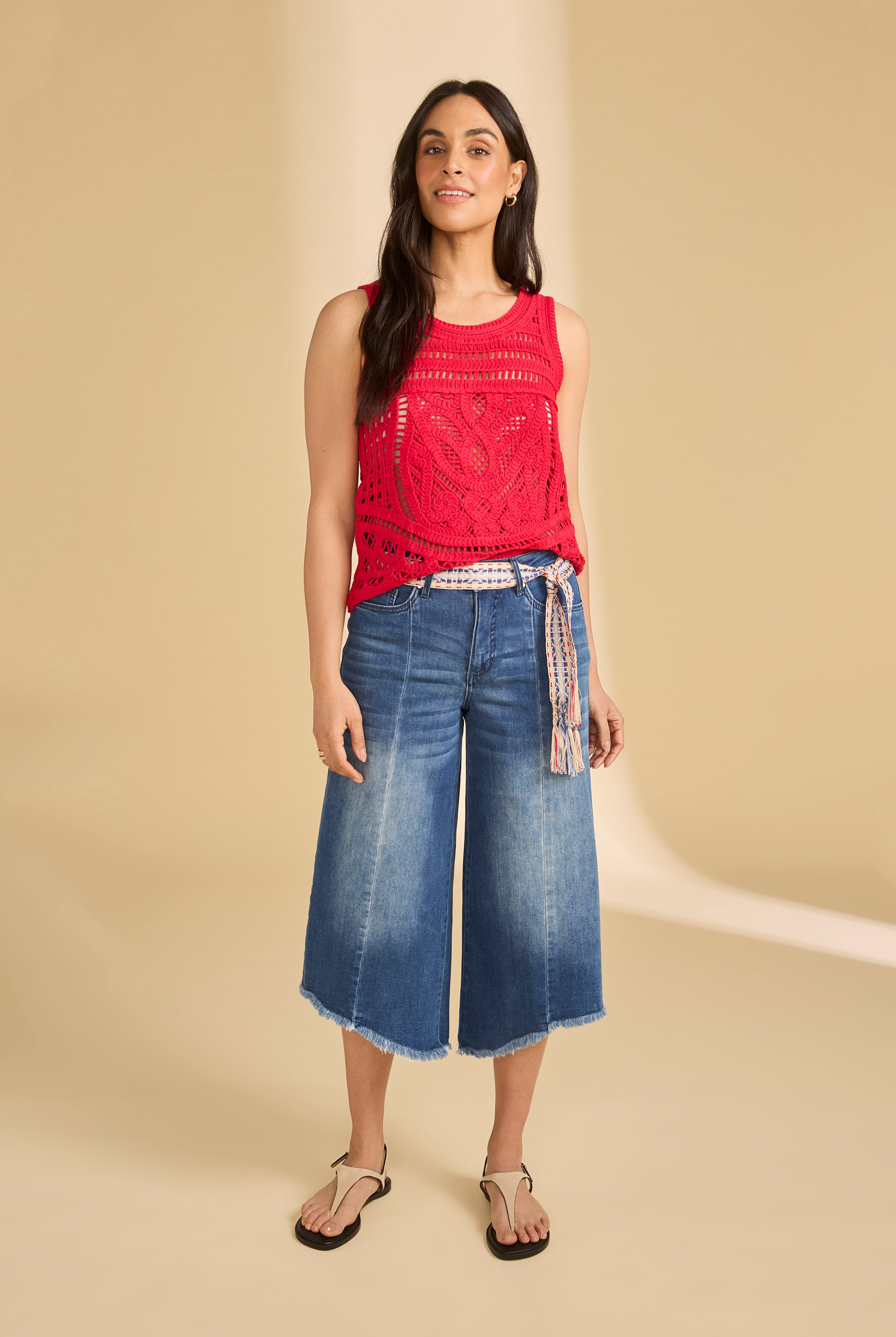 Full view of red crochet tank paired with wide-leg jeans by French Dressing Jeans (FDJ)