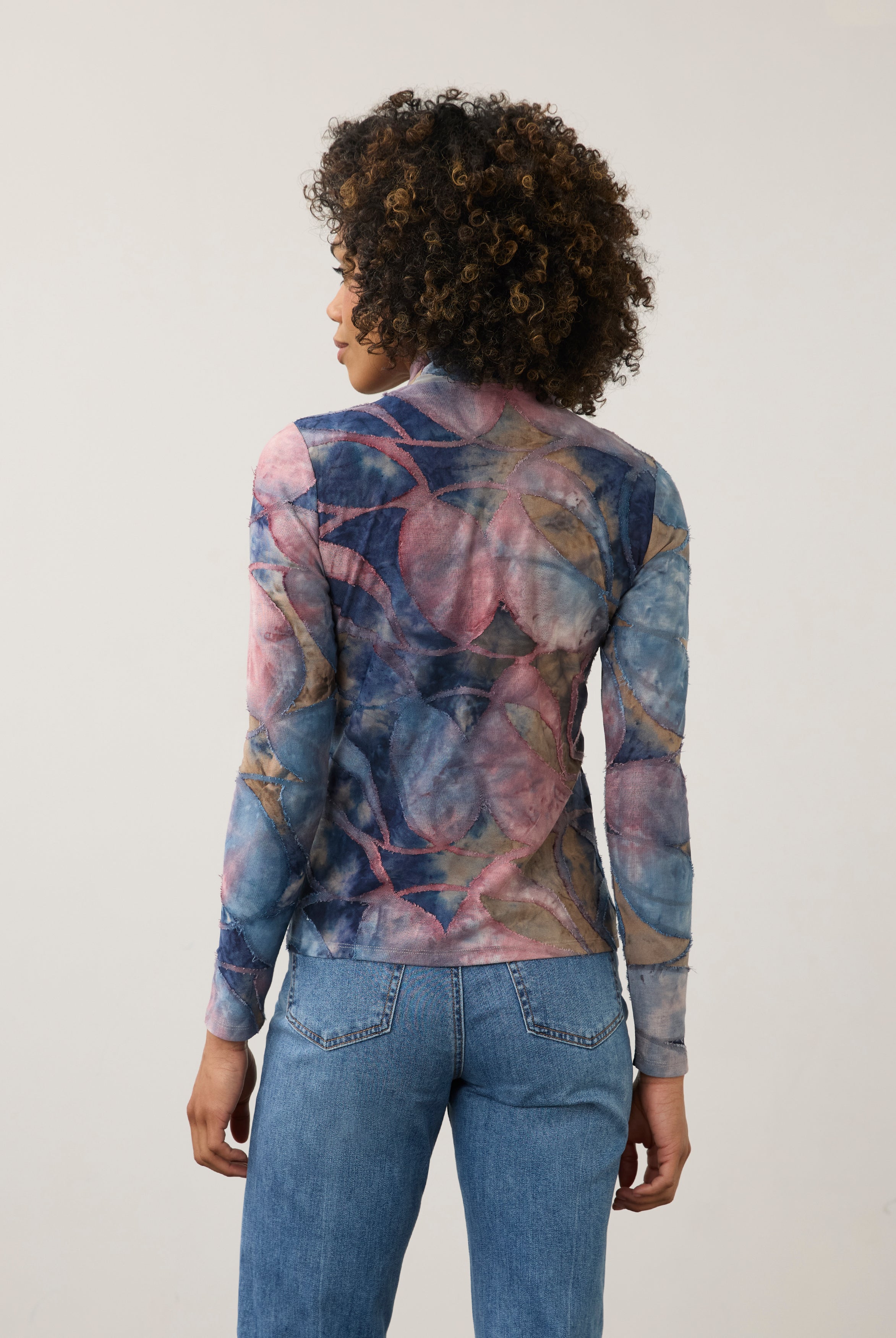 Back view of abstract blue and pink print top, highlighting seamless design by French Dressing Jeans (FDJ)