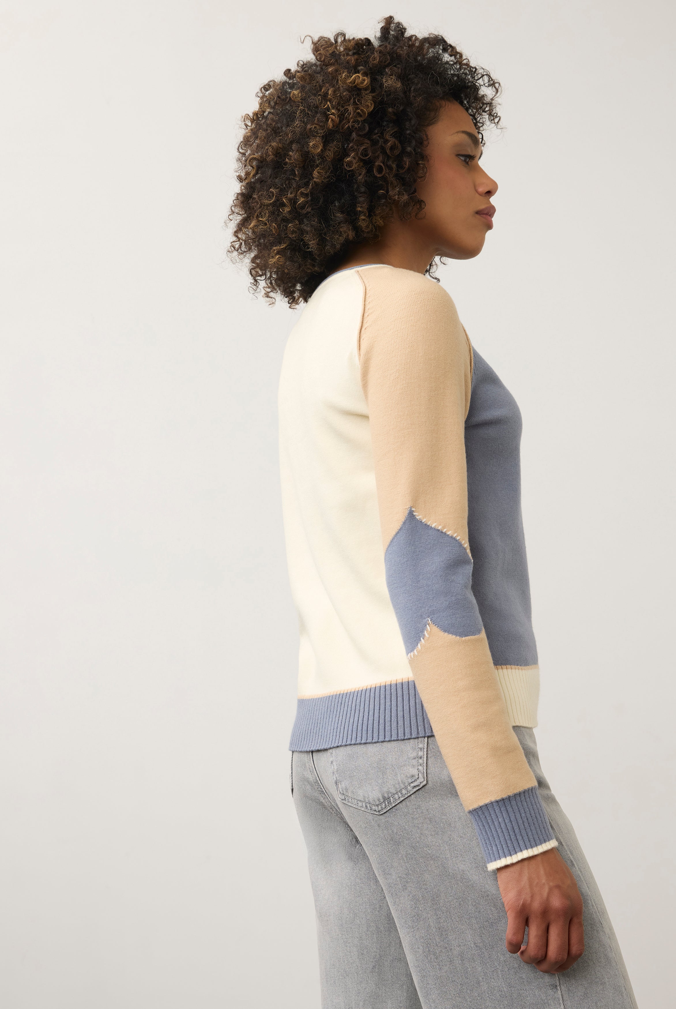 Side view of colorblock sweater highlighting contrasting sleeves by French Dressing Jeans (FDJ)