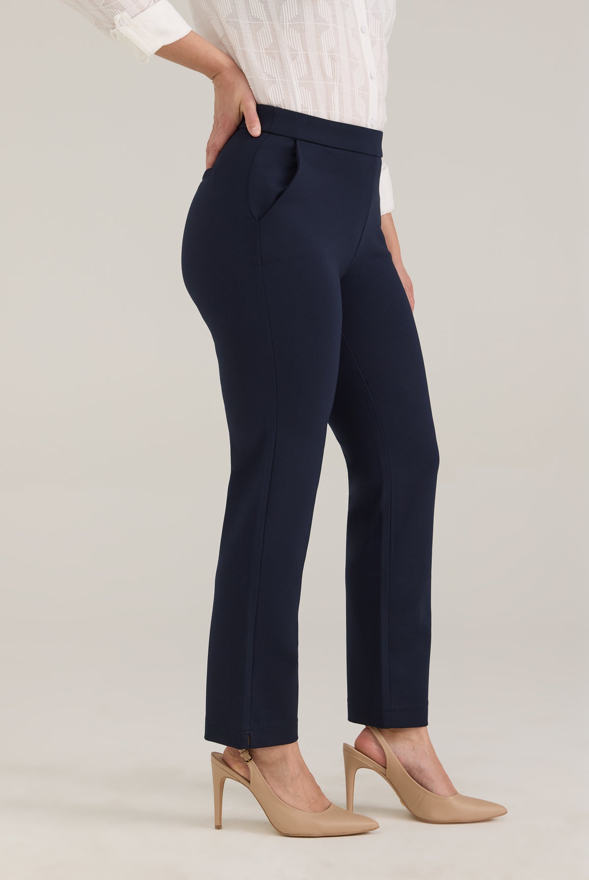 Side profile of navy pants highlighting straight ankle silhouette and front pockets by French Dressing Jeans (FDJ)