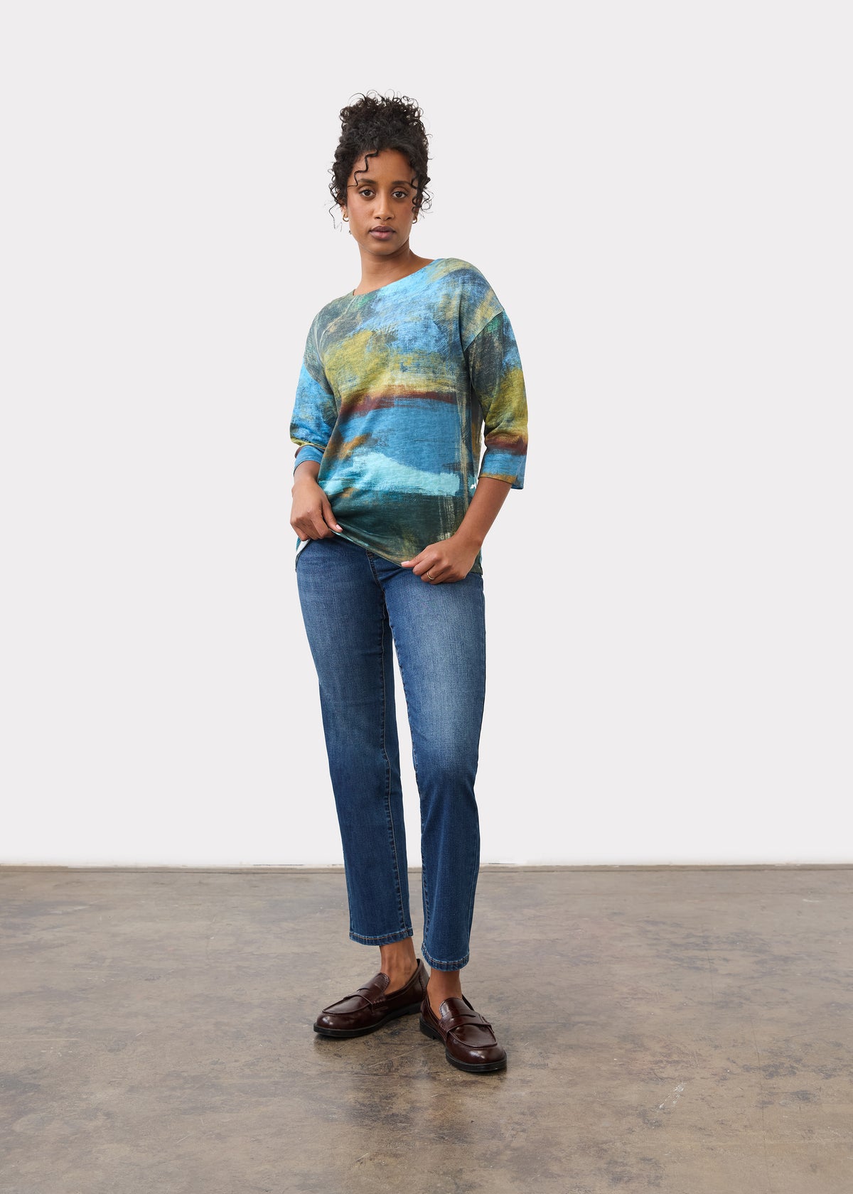 Full body view of blue abstract print top with jeans and loafers by French Dressing Jeans (FDJ)