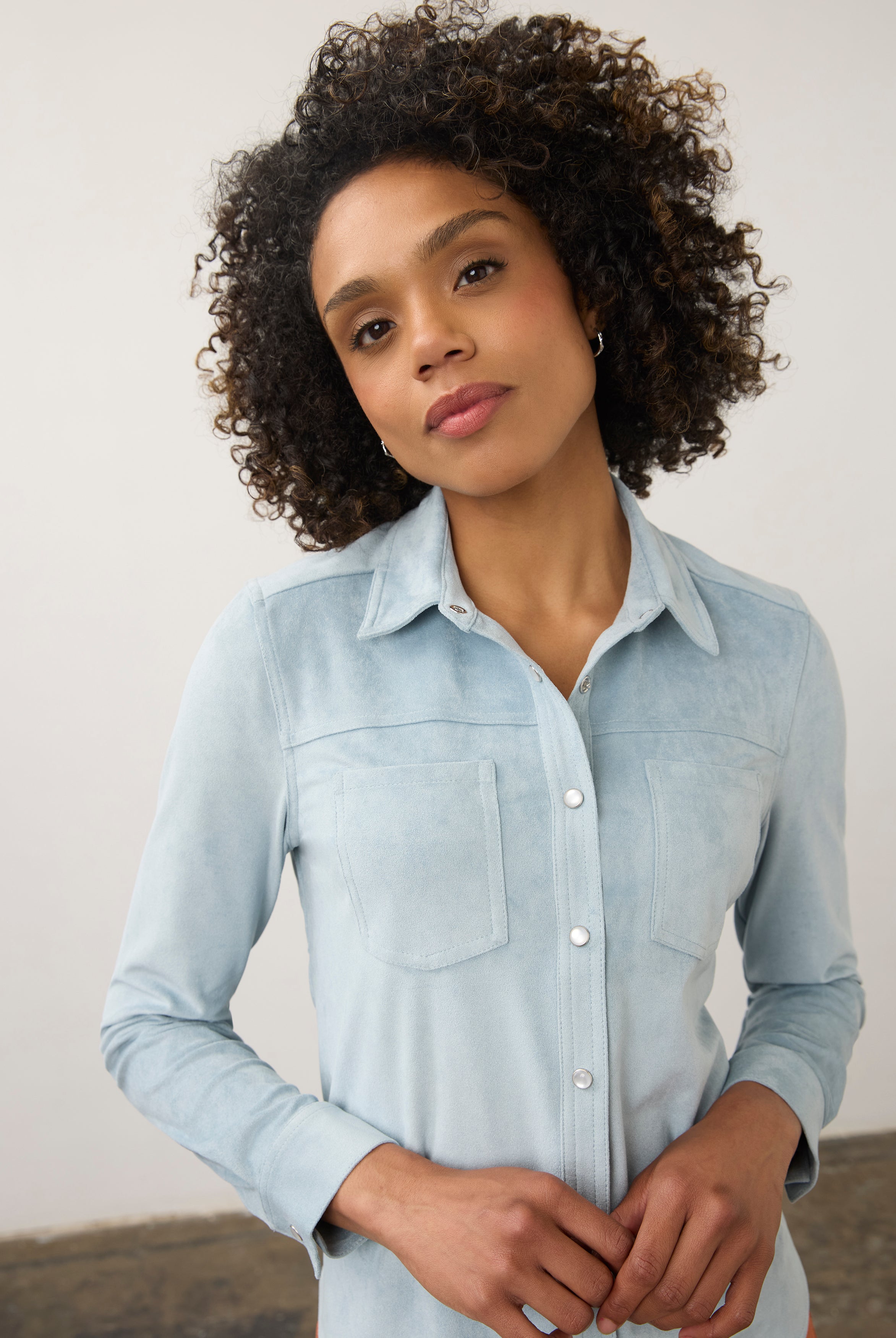 Close-up of light blue suede shirt highlighting button details by French Dressing Jeans (FDJ)