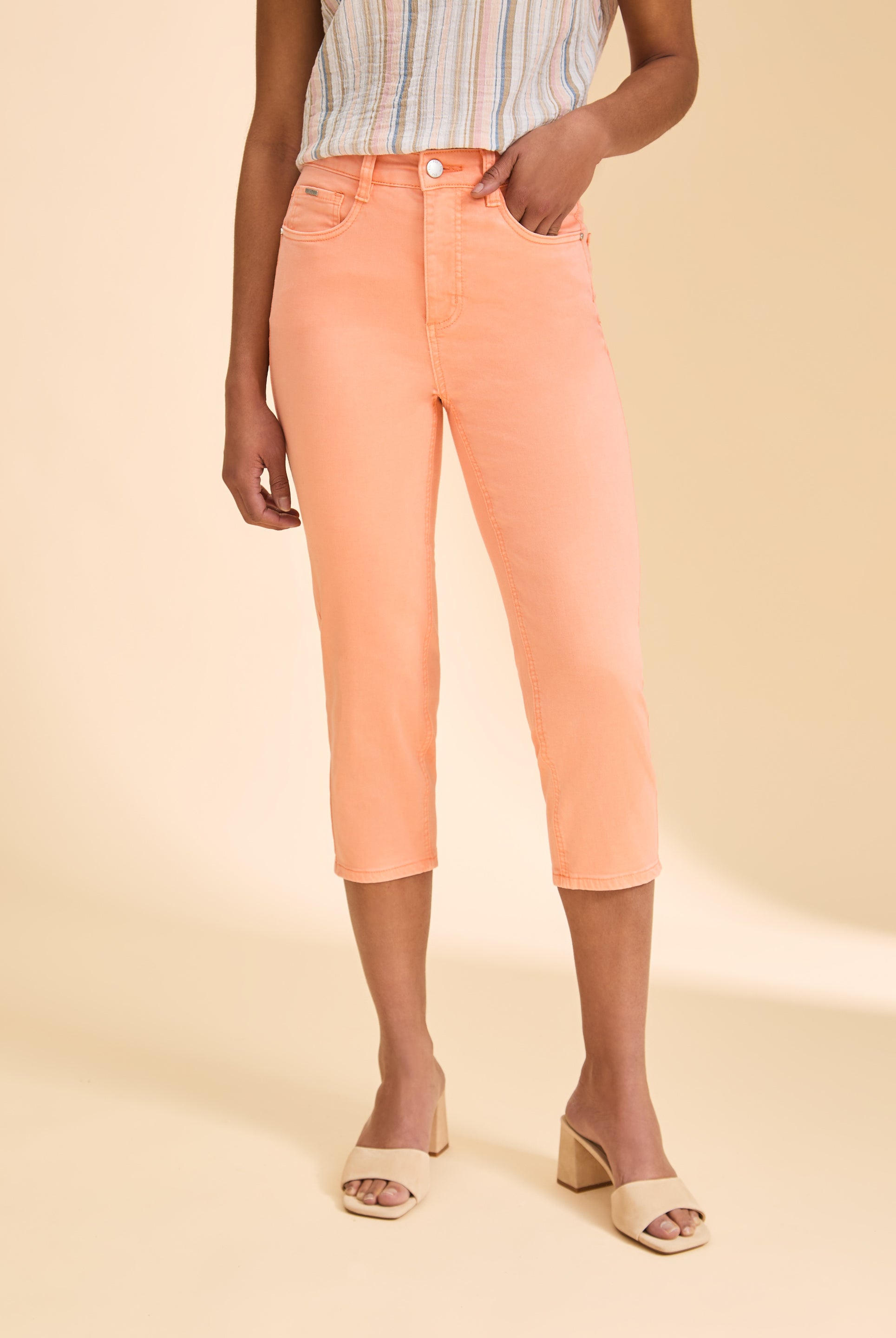 Close-up front view of peach cropped jeans, highlighting high-rise waist by French Dressing Jeans (FDJ)