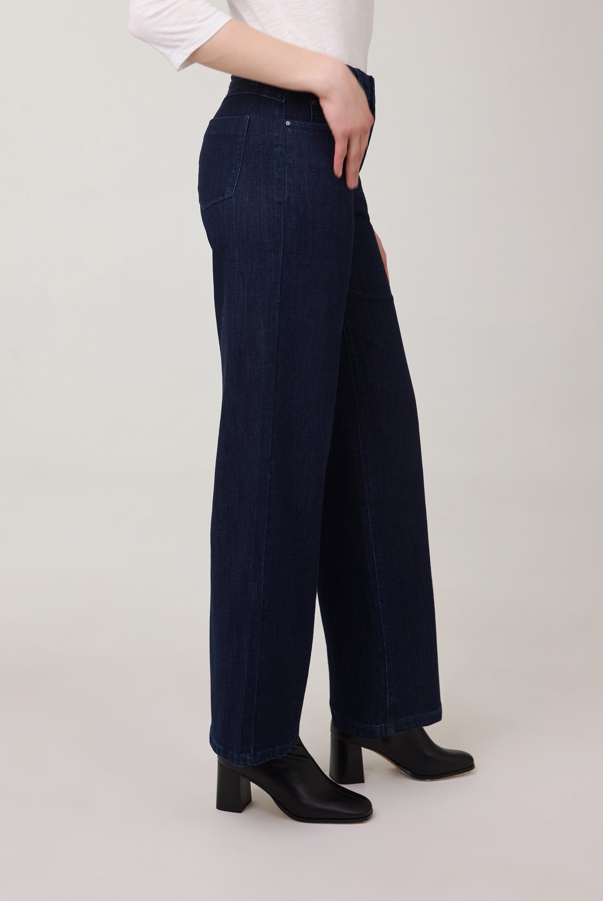 Side profile of dark wide-leg jeans in Delight color by French Dressing Jeans (FDJ)