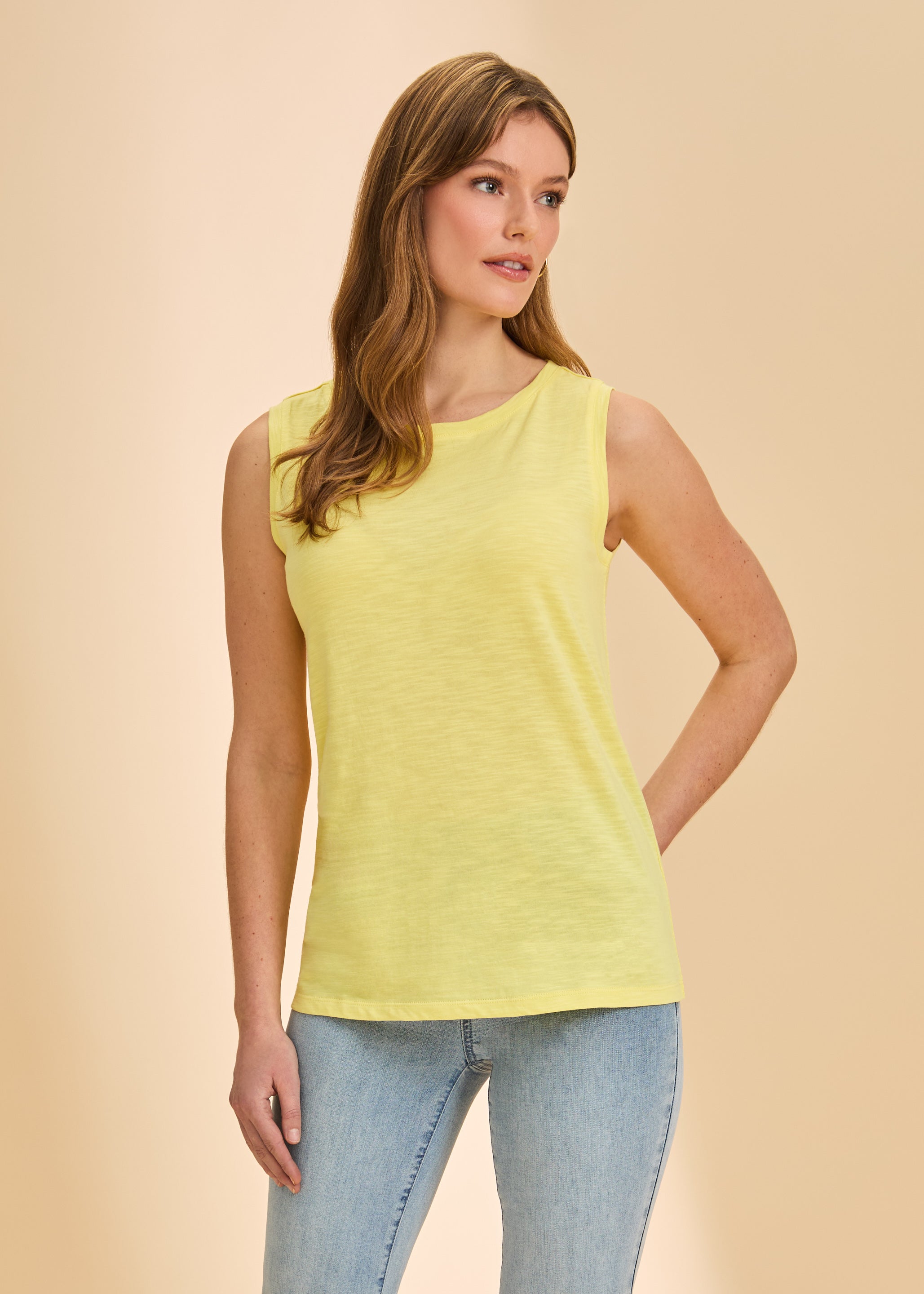 Front view of yellow sleeveless top with round neckline and light denim for sunny style by French Dressing Jeans (FDJ)