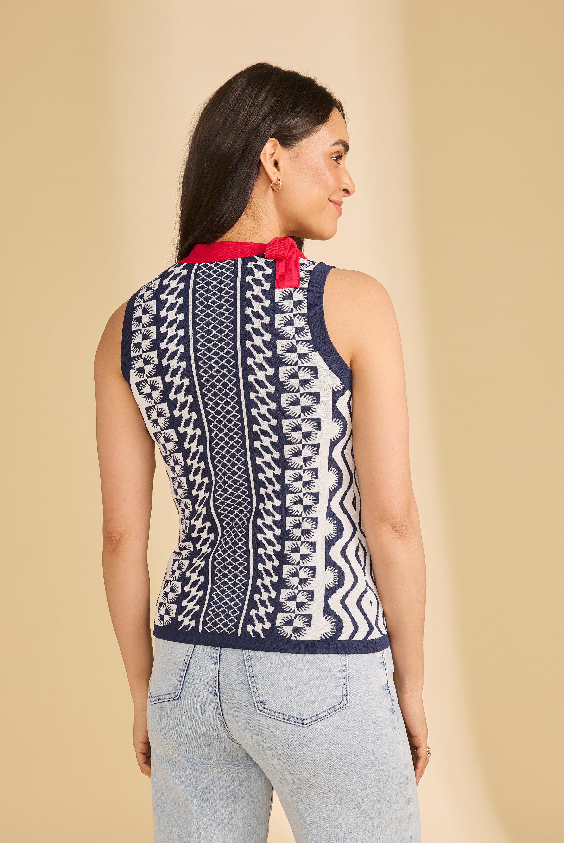 Back view of navy sleeveless top with detailed pattern and red collar by French Dressing Jeans (FDJ)