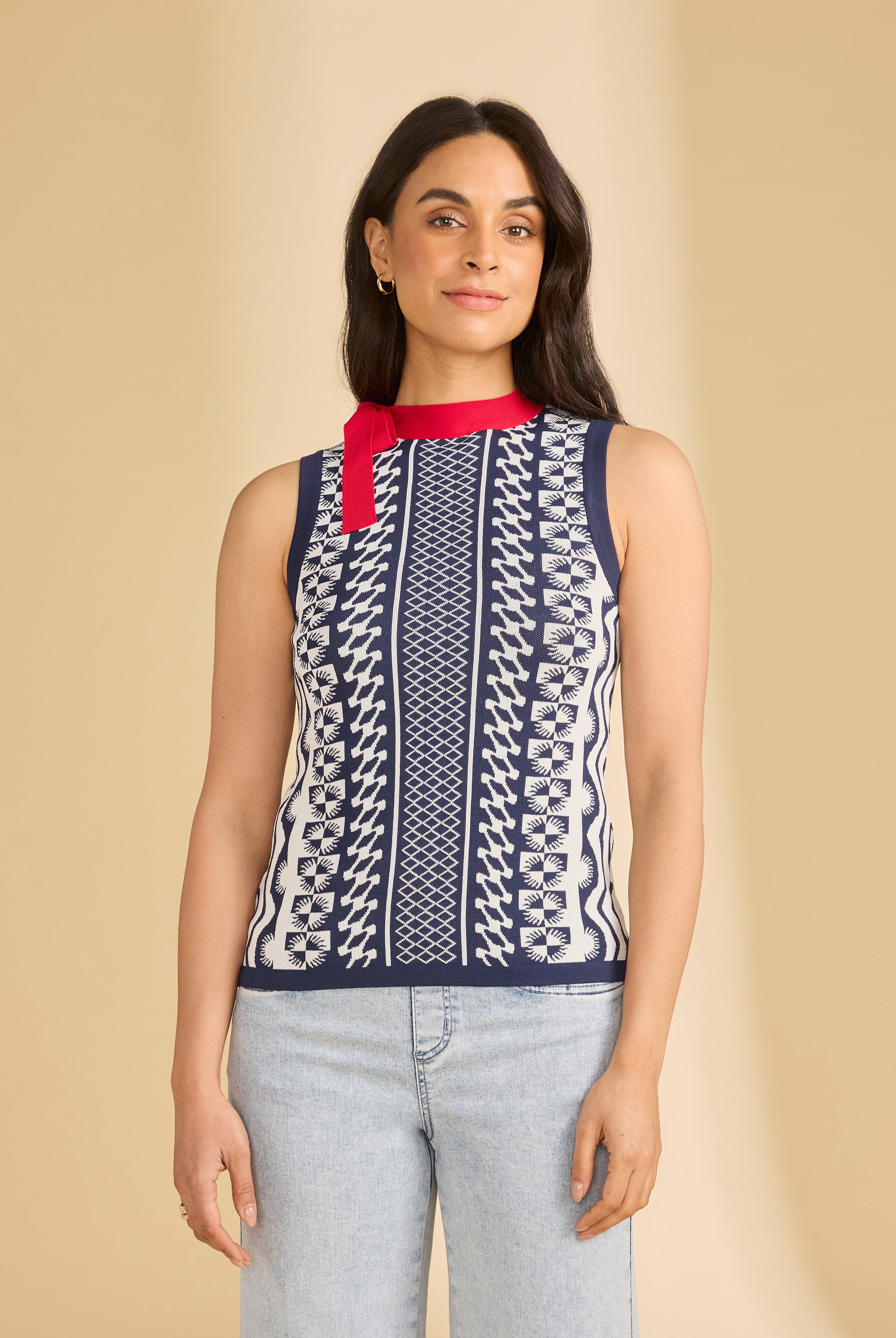 Front view of navy sleeveless top with intricate patterns and red neckline by French Dressing Jeans (FDJ)