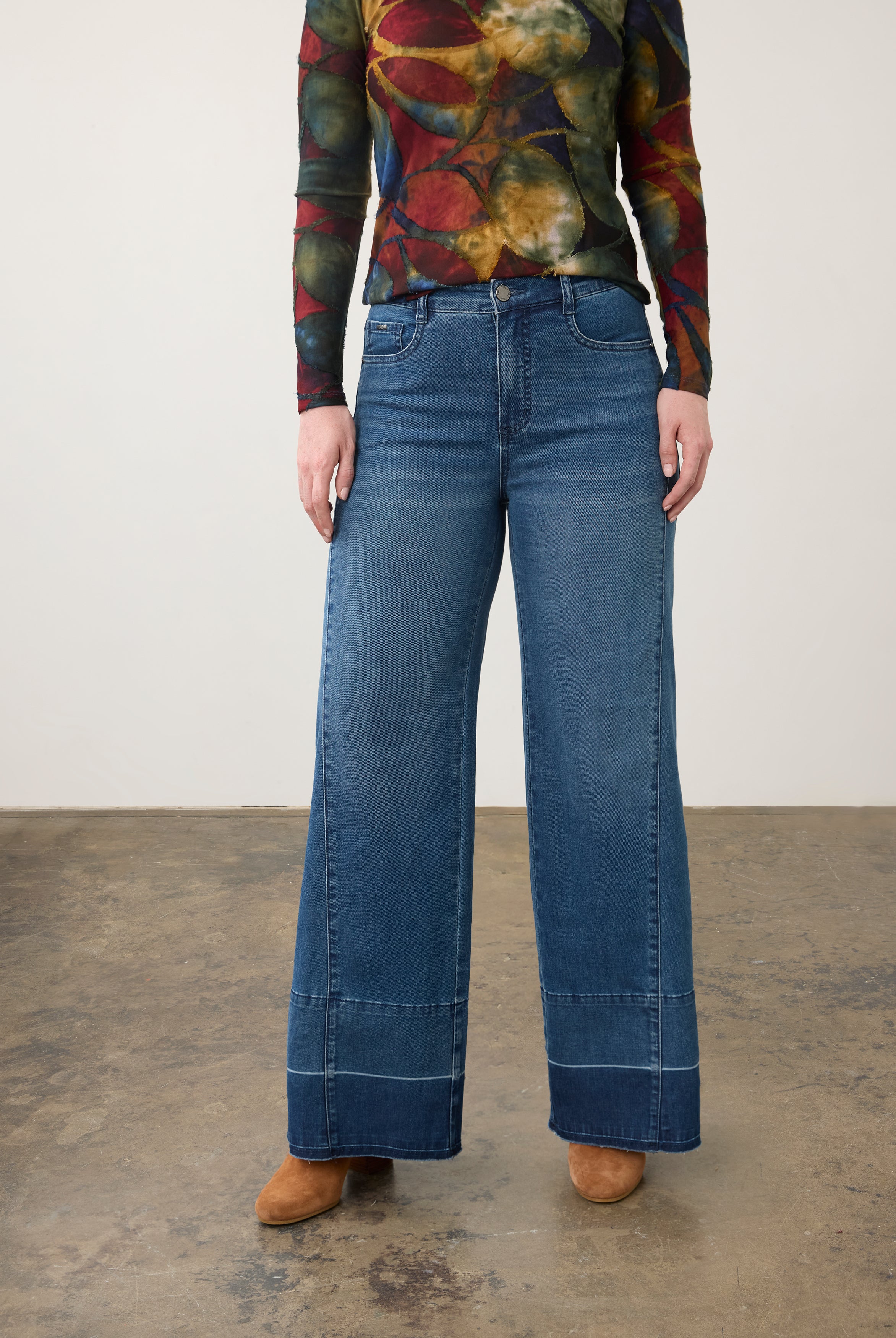 Front view of wide-leg dark wash jeans with artistic top, showing front pockets by French Dressing Jeans (FDJ) par French Dressing Jeans (FDJ)