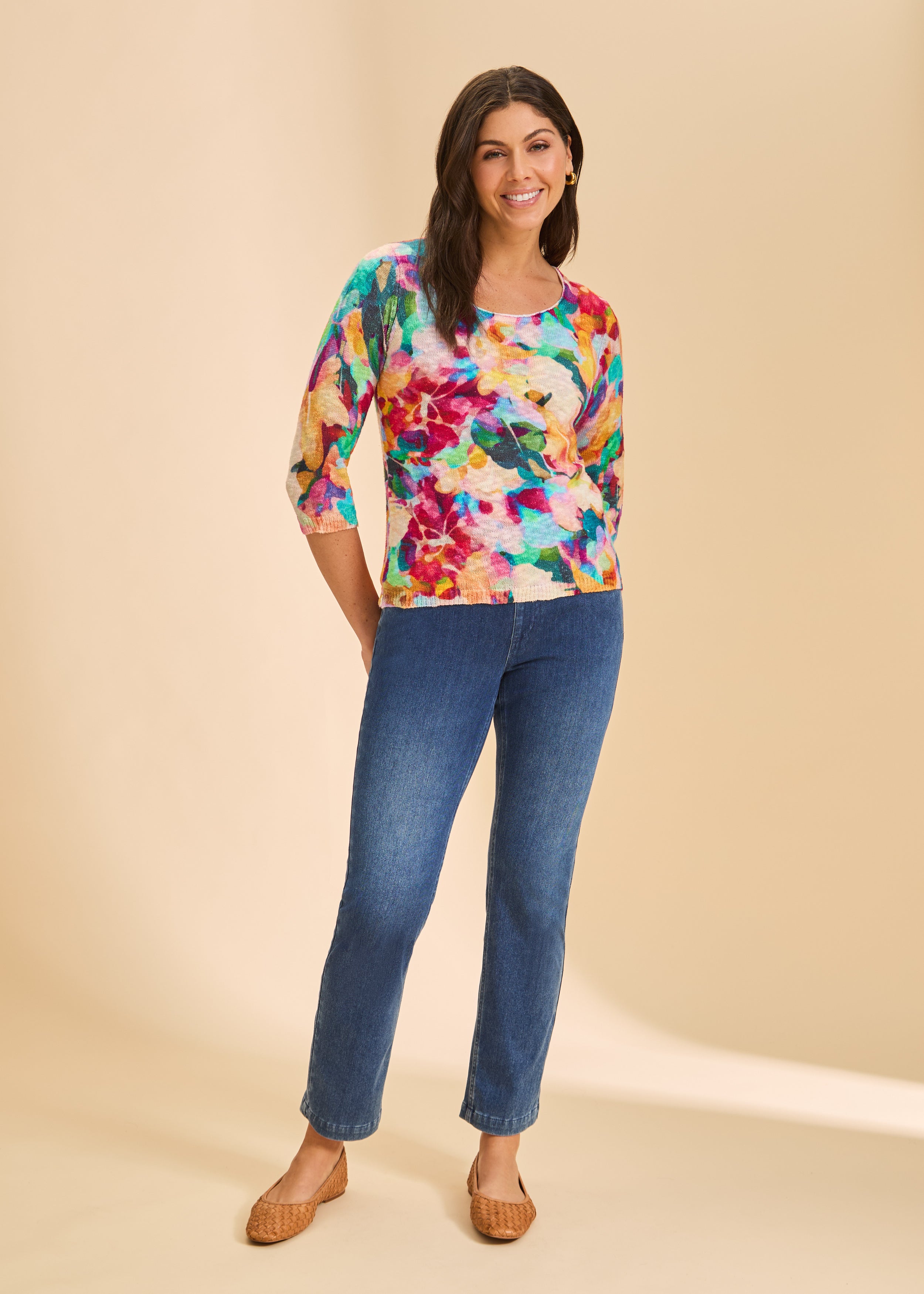 Full front view of blue denim pull-on straight leg jeans paired with colorful top by French Dressing Jeans (FDJ)