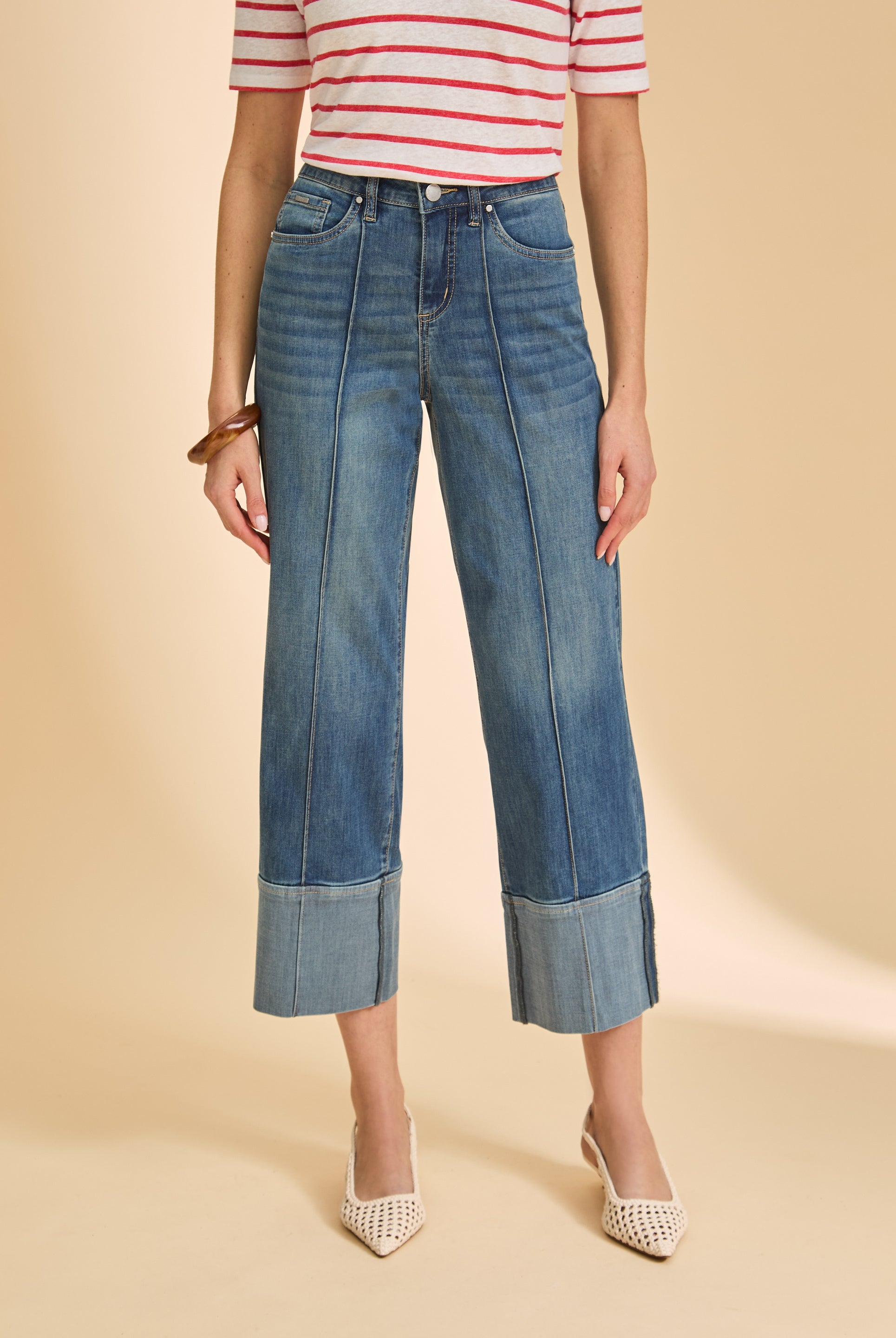 Close-up of dark wash wide-leg jeans with cuffed hems and seam details by French Dressing Jeans (FDJ)