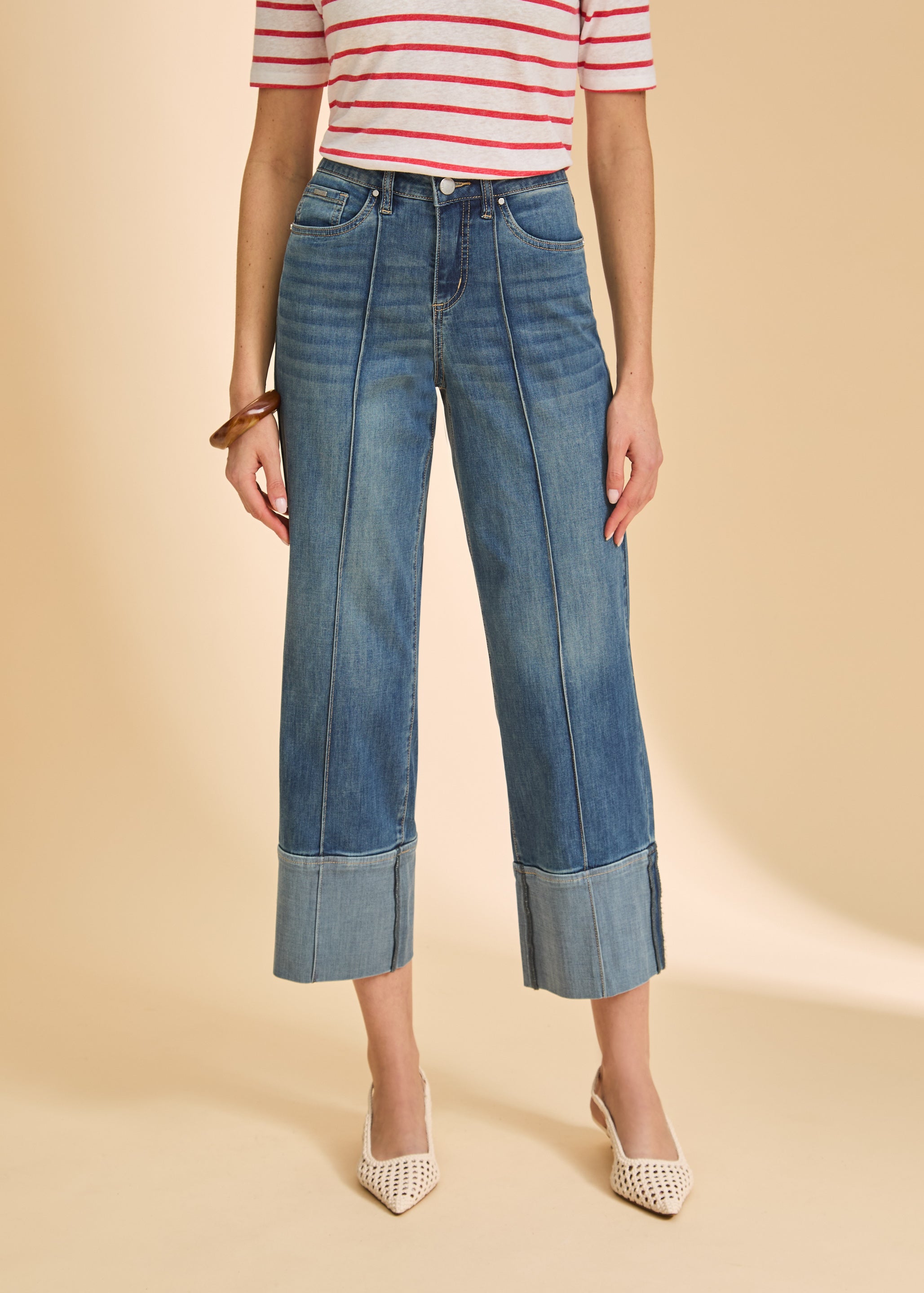 Close-up of dark wash wide-leg jeans with cuffed hems and seam details by French Dressing Jeans (FDJ)