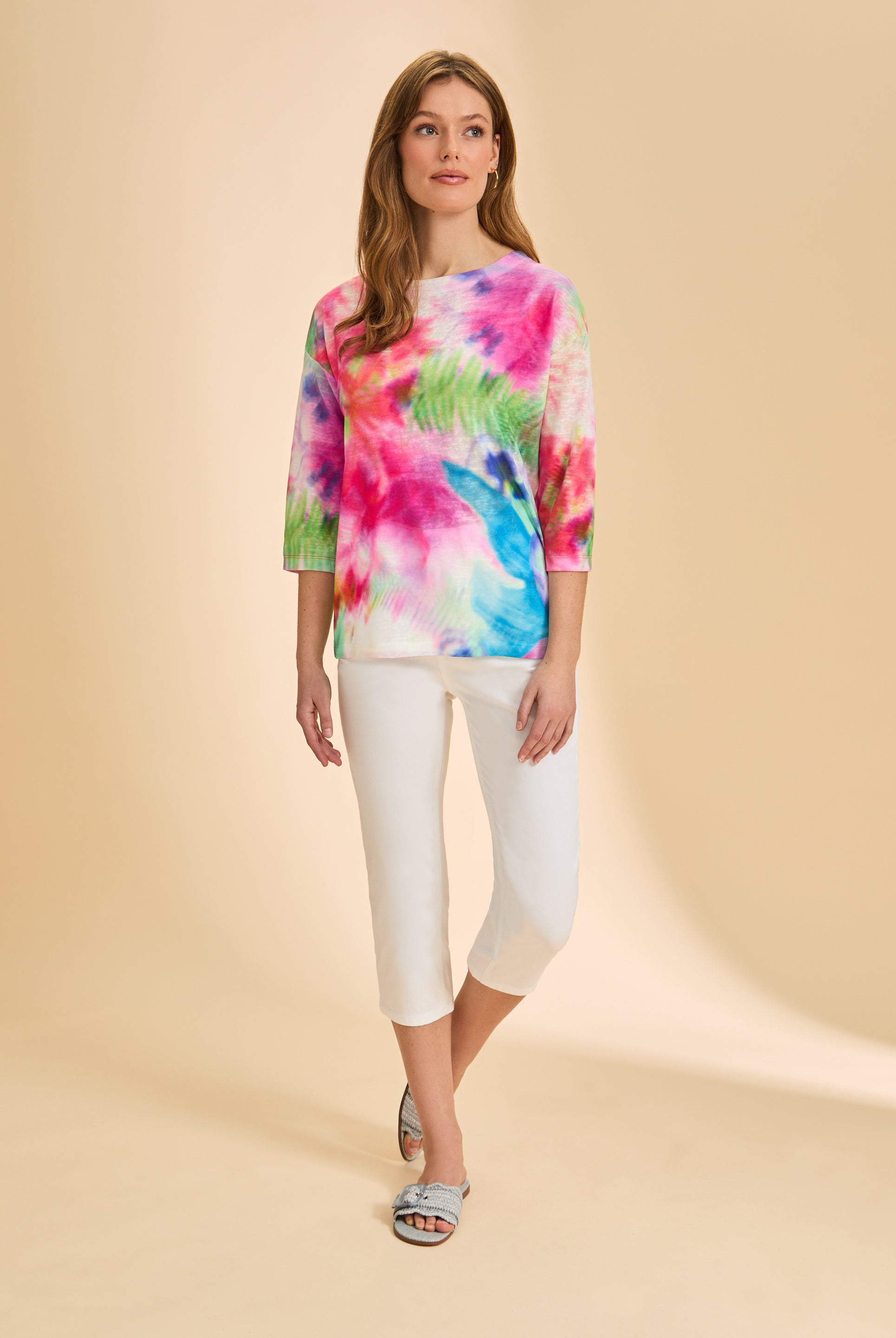 Full-body view of floral 3/4 sleeve top paired with white pants by French Dressing Jeans (FDJ)