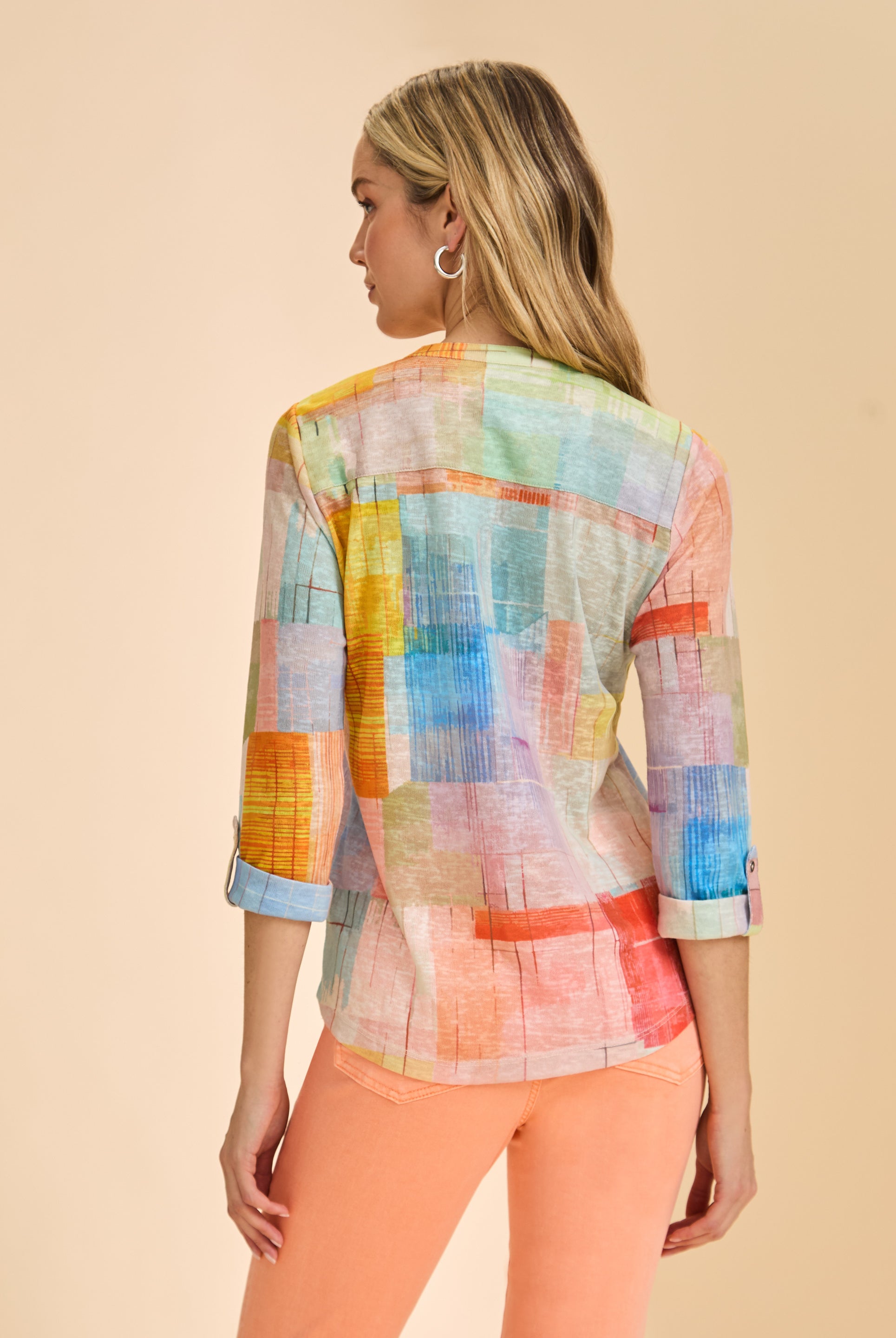 Back view highlighting pastel patchwork design on 3/4 sleeve top by French Dressing Jeans (FDJ)