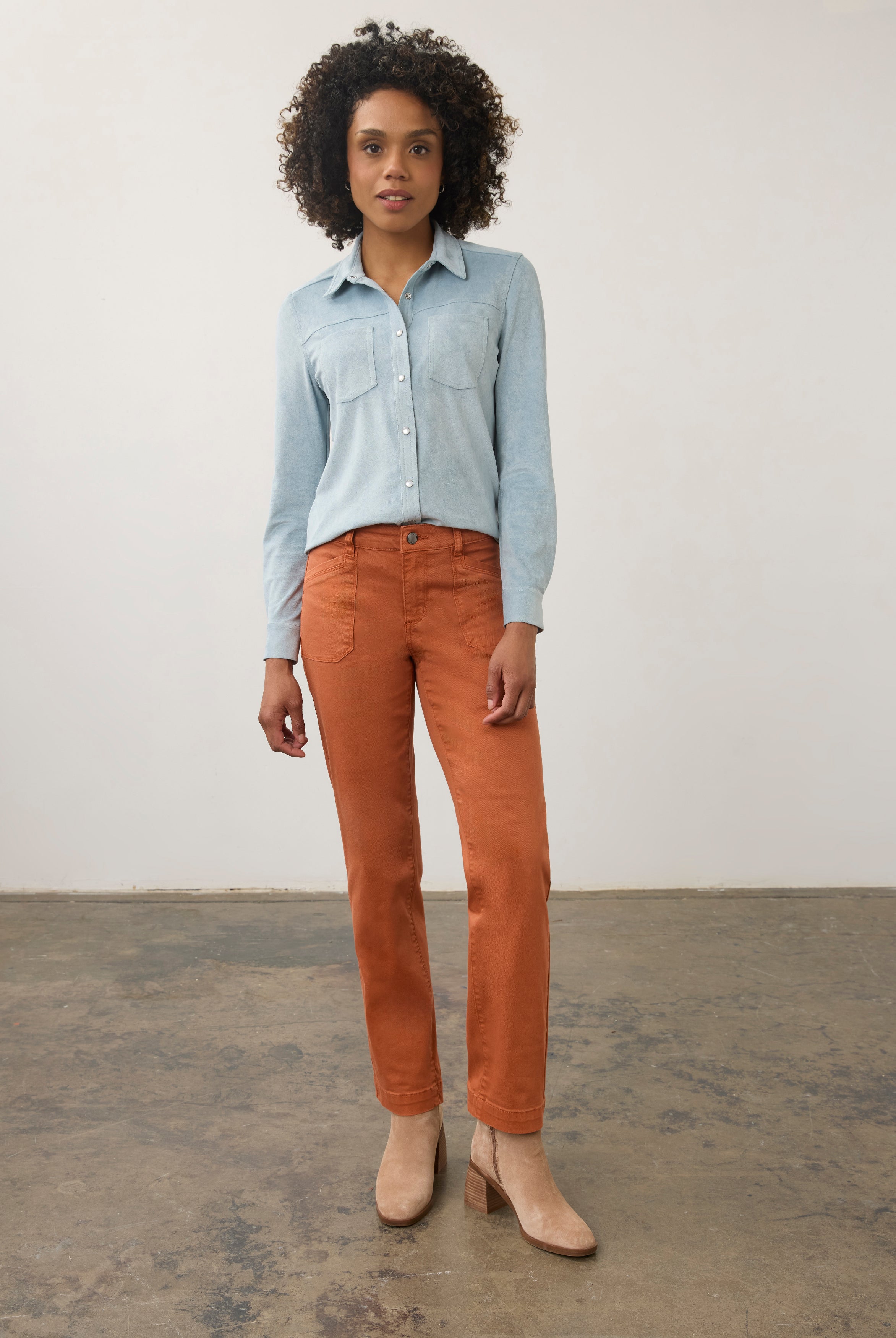 Model in light blue suede shirt and orange pants, full body view by French Dressing Jeans (FDJ)