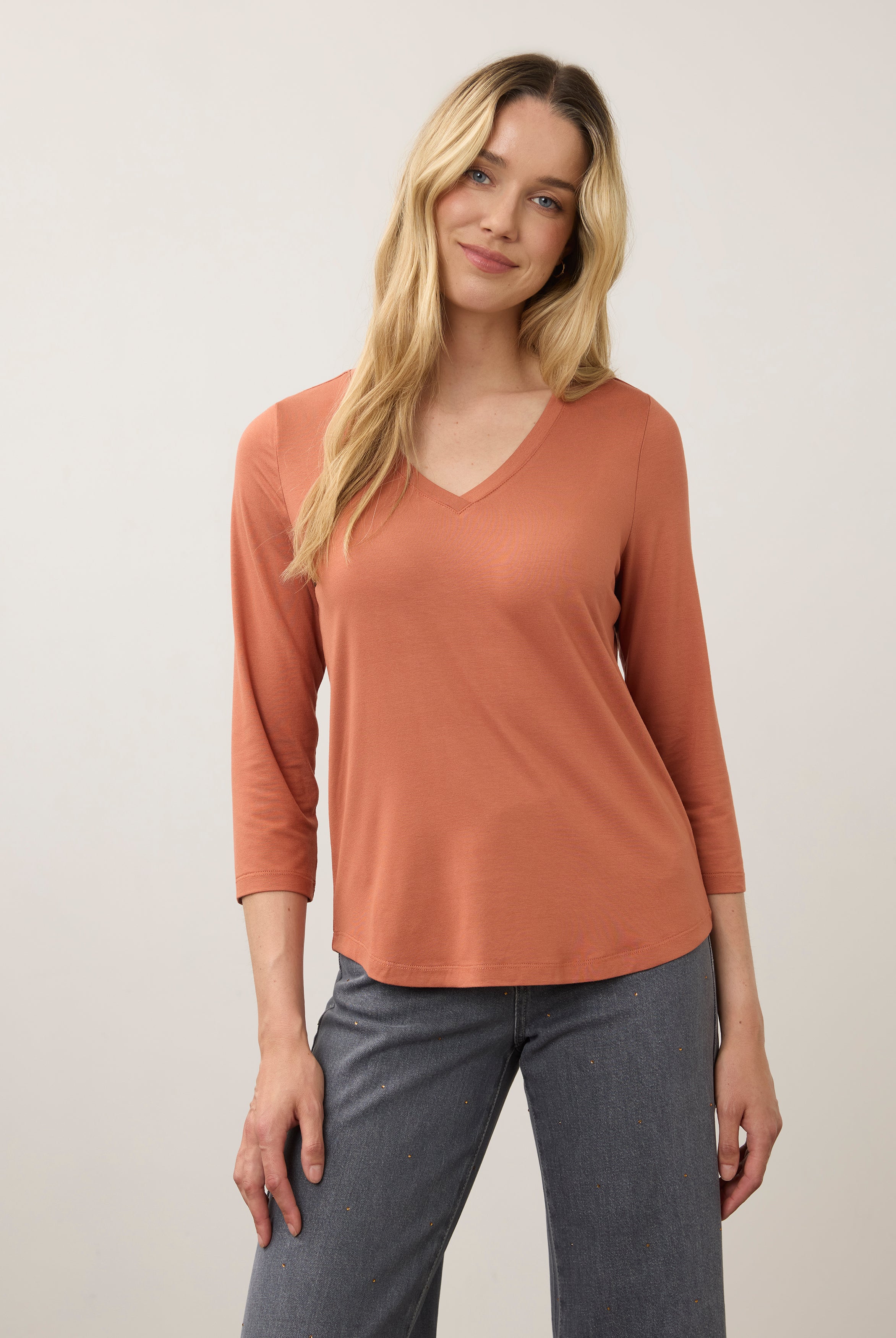 Front view of orange 3/4 sleeve V-neck top with warm tones and relaxed fit by French Dressing Jeans (FDJ)