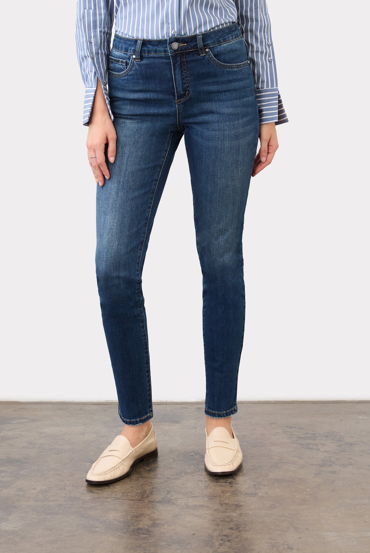 Front view of Olivia slim ankle denim in dark wash showing mid-rise waist and front pockets by French Dressing Jeans (FDJ)