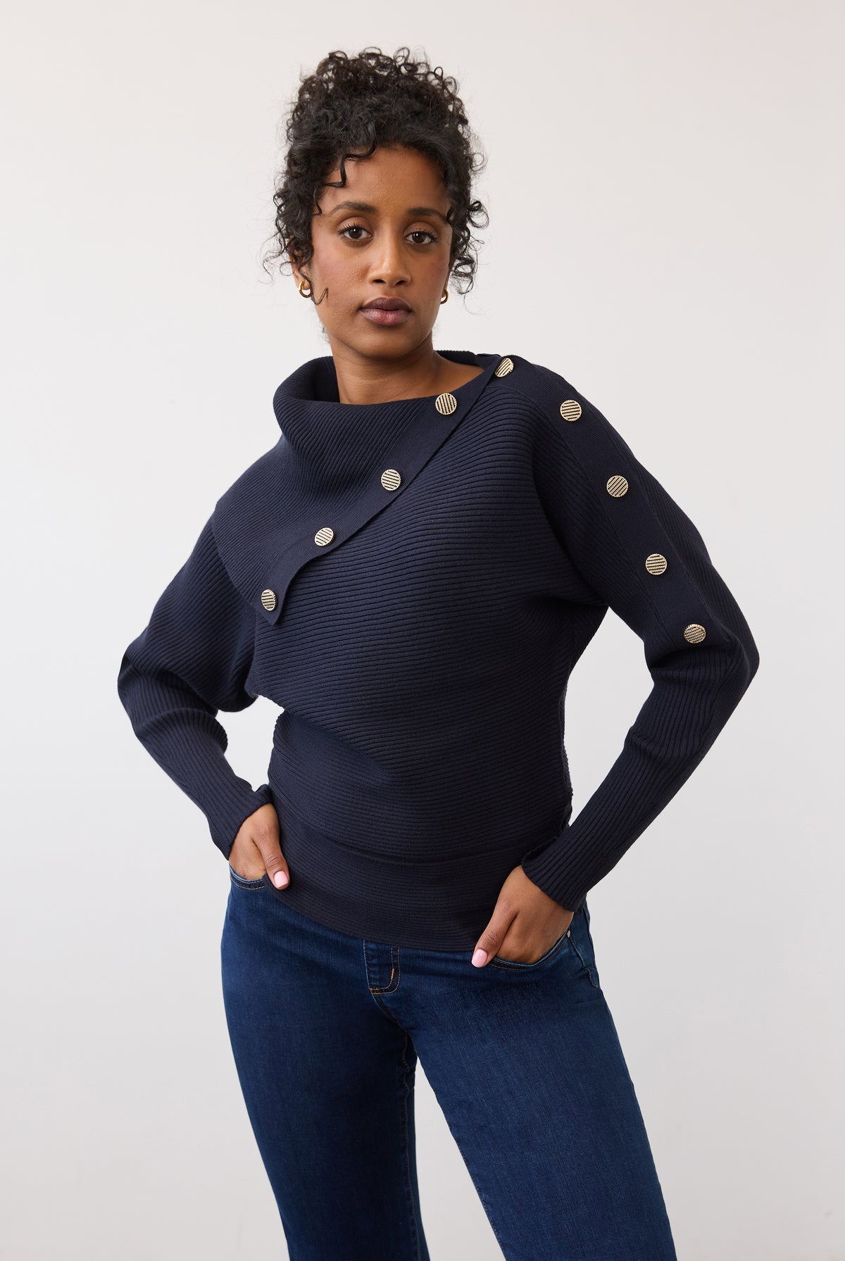 Front view of navy sweater with side button design and fitted silhouette by French Dressing Jeans (FDJ)