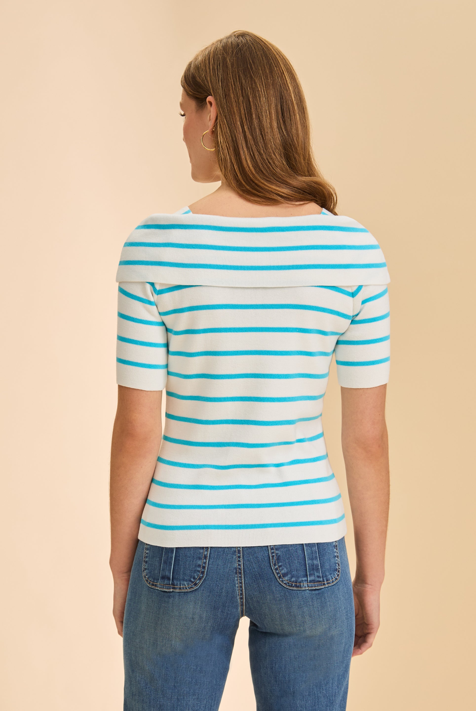 Back view of black and white boatneck stripe sweater highlighting clean lines by French Dressing Jeans (FDJ)