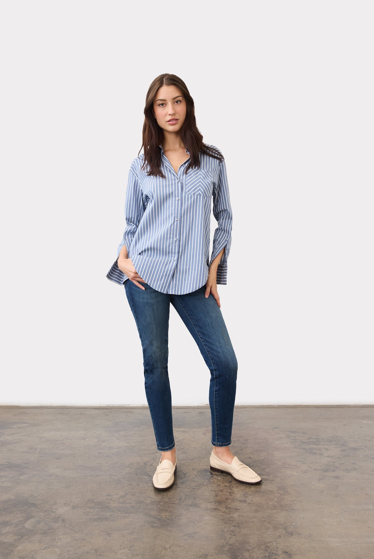 Full view of blue striped shirt styled with jeans for a casual look by French Dressing Jeans (FDJ)