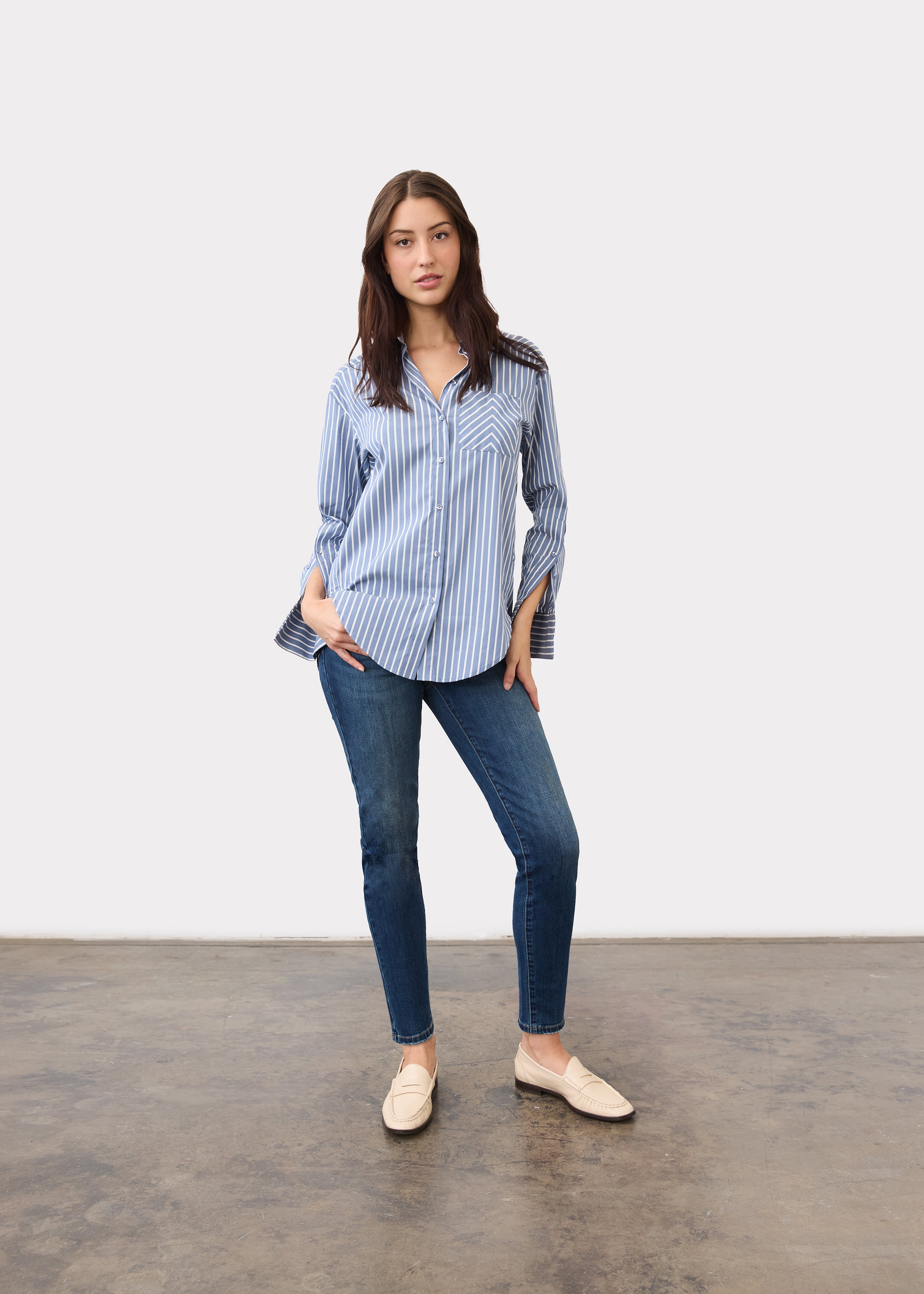 Full view of blue striped shirt styled with jeans for a casual look by French Dressing Jeans (FDJ)