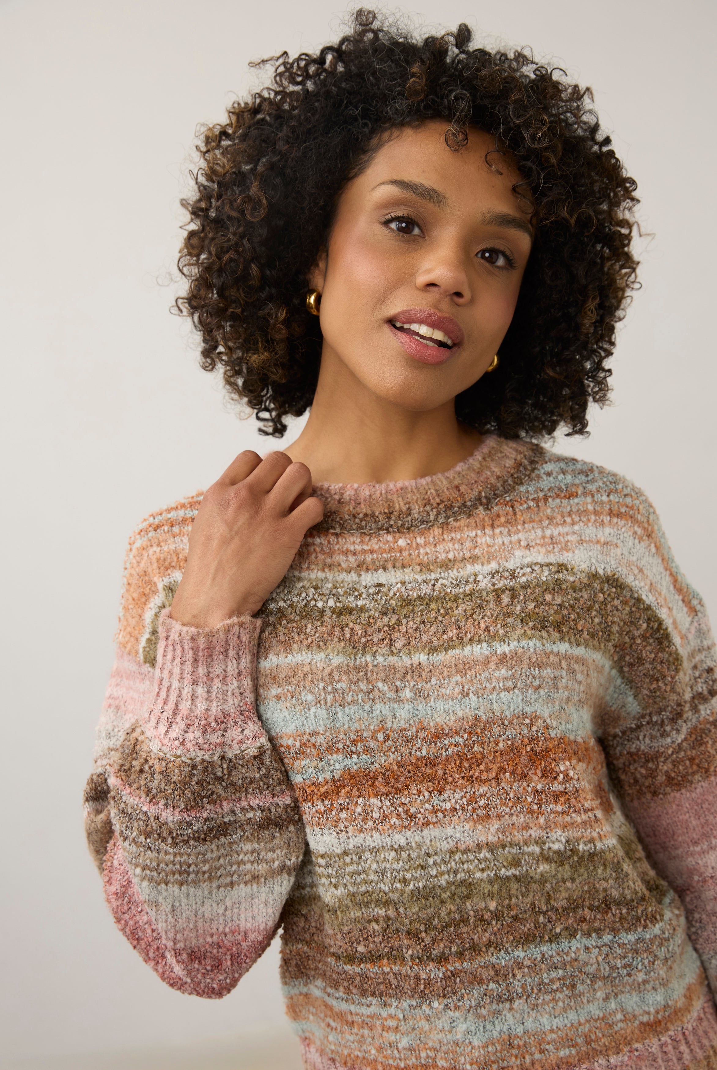 Detail shot of natural spacedye boucle sweater focusing on boat neckline by French Dressing Jeans (FDJ)