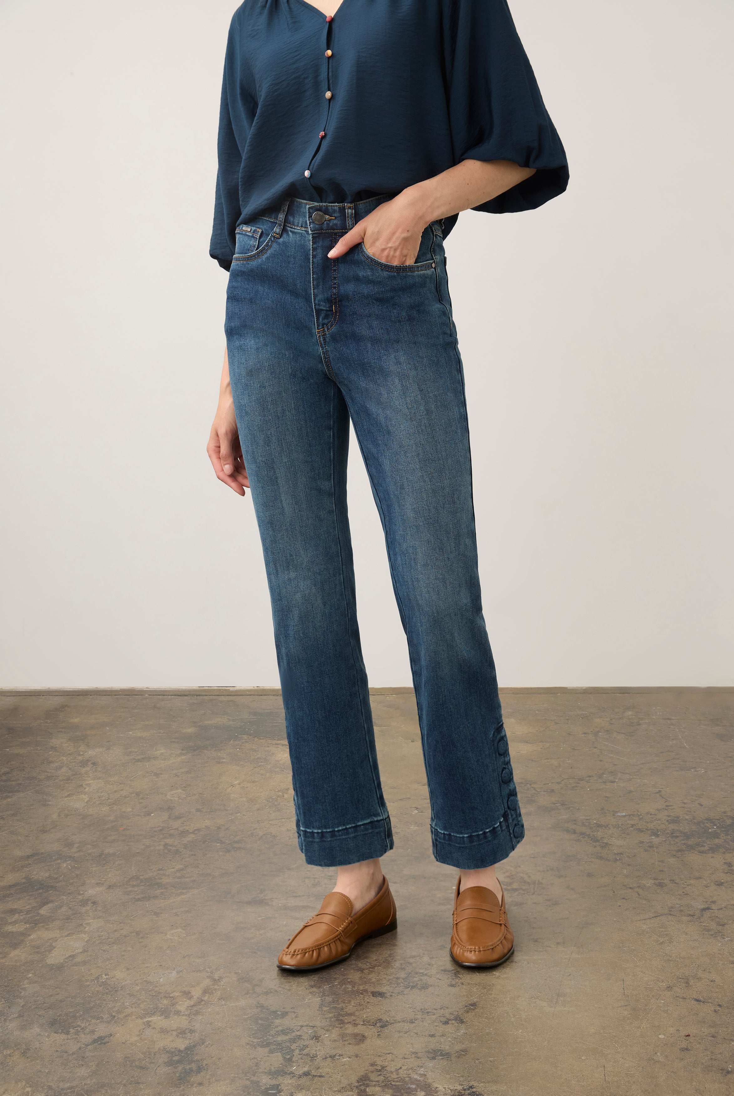 Front view of medium blue Olivia denim with a mid-rise waist and buttoned cuffs by French Dressing Jeans (FDJ)