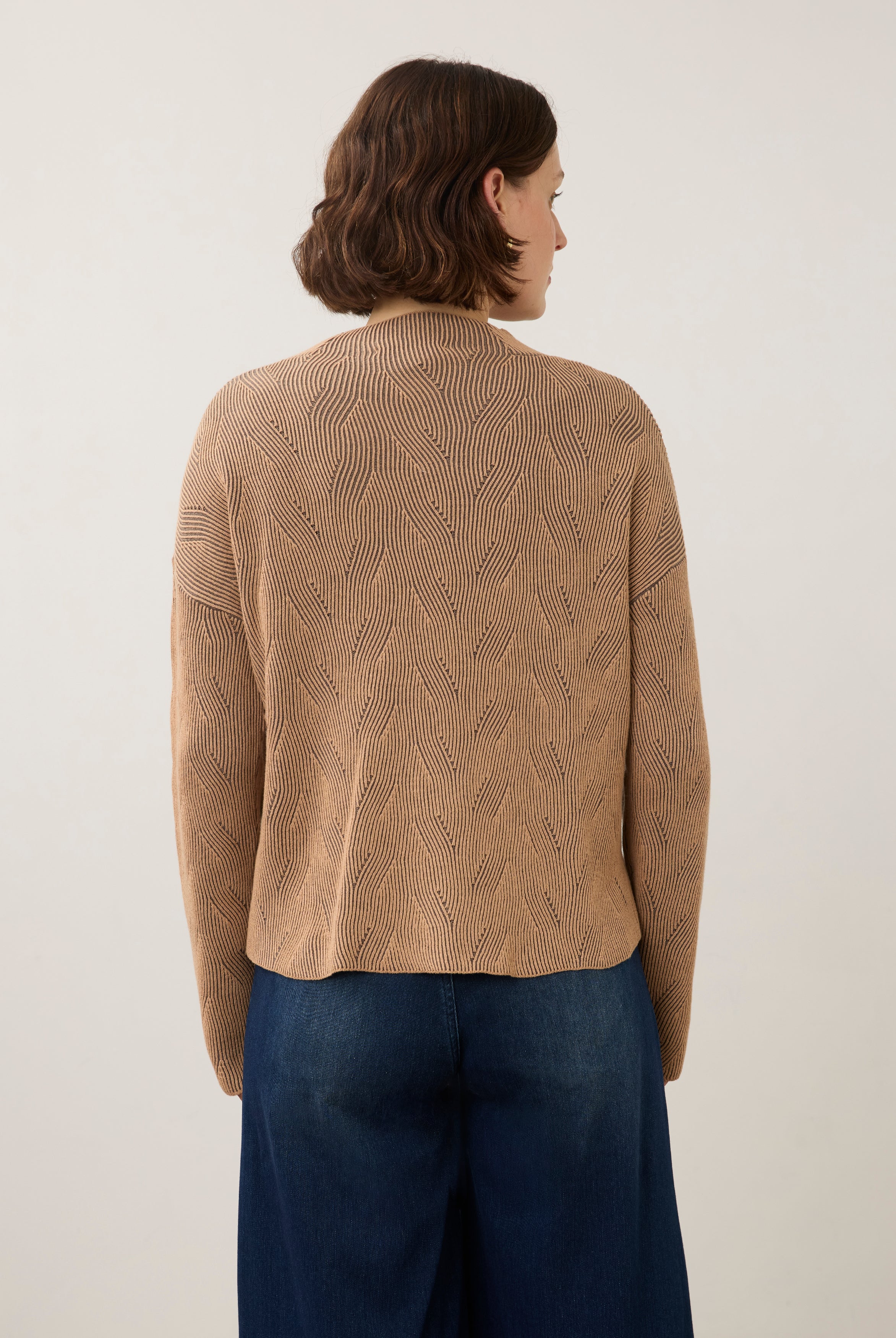 Back view of tan textured top showing seamless design by French Dressing Jeans (FDJ)