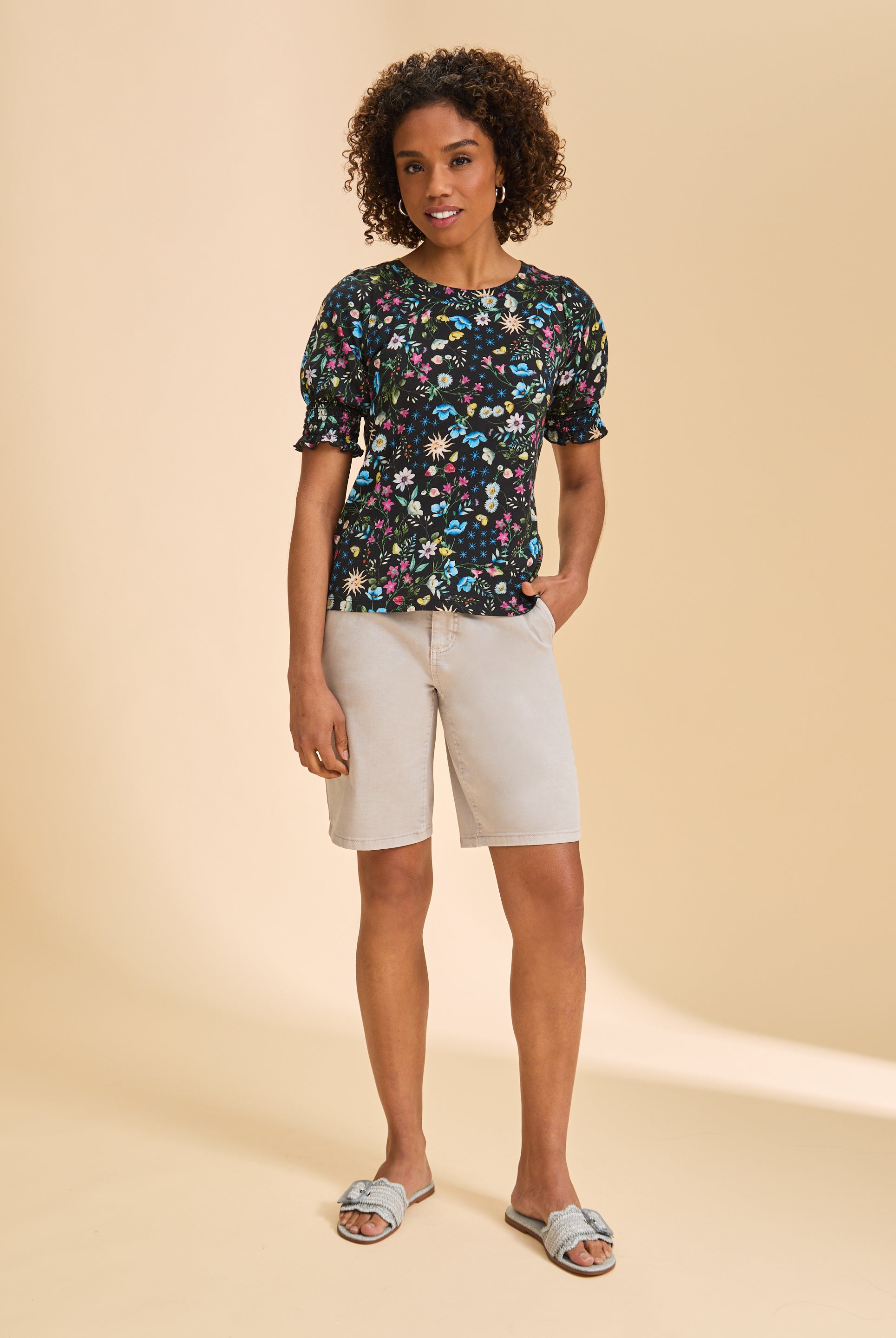 Front view of Petite Suzanne shorts in taupe, paired with floral top by French Dressing Jeans (FDJ)