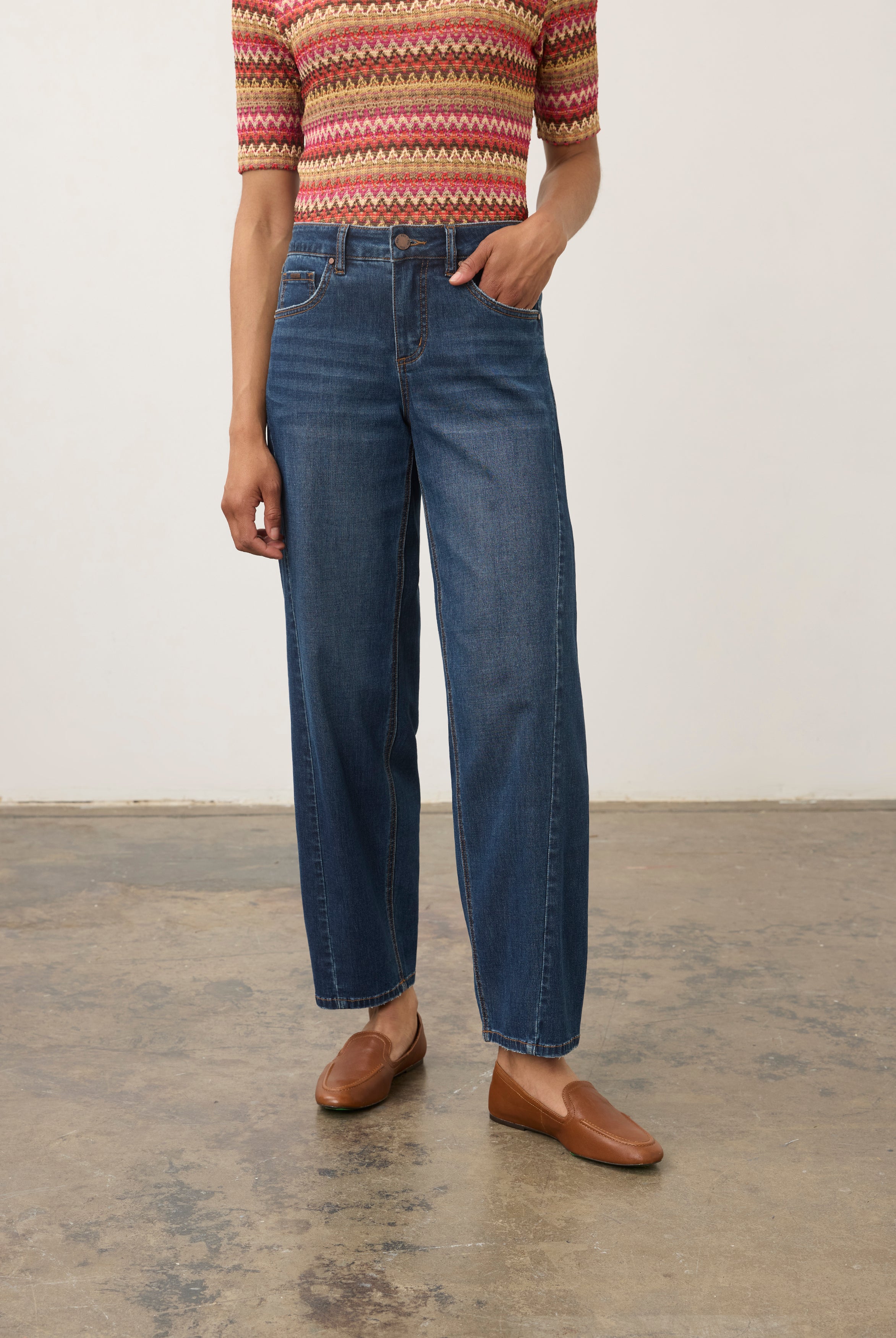 Front view of dark wash jeans with colorful knit top, showing front pockets by French Dressing Jeans (FDJ) par French Dressing Jeans (FDJ)