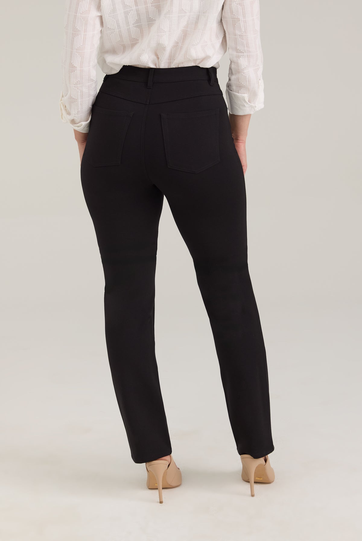 Back view of black pants featuring patch pockets by French Dressing Jeans (FDJ)