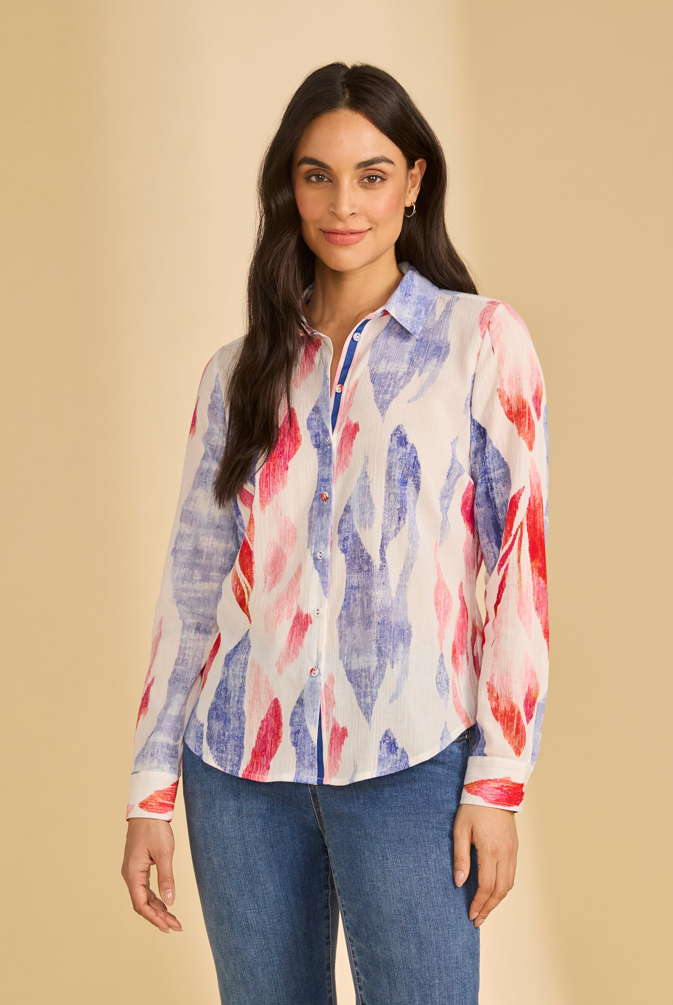 Front view of colorful long sleeve button-up blouse with vibrant pattern, by French Dressing Jeans (FDJ)
