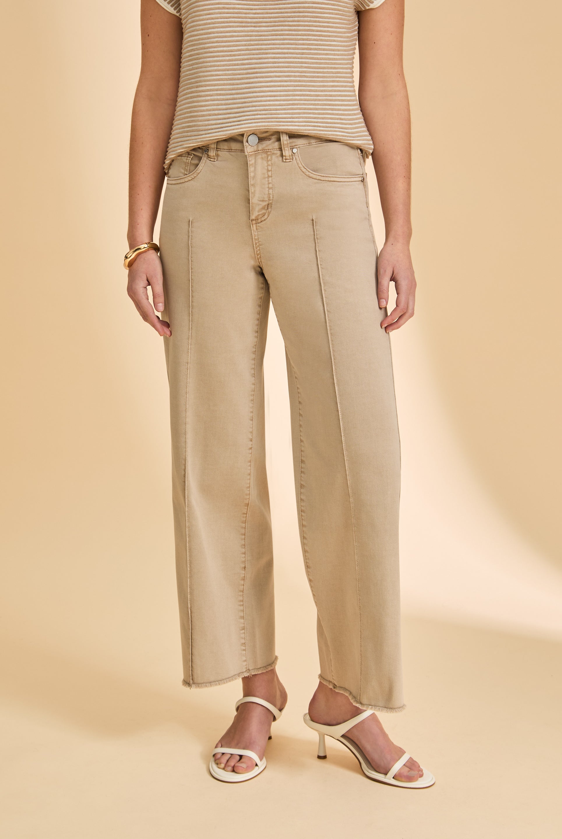 Close-up of beige wide-leg pants with front pockets by French Dressing Jeans (FDJ)