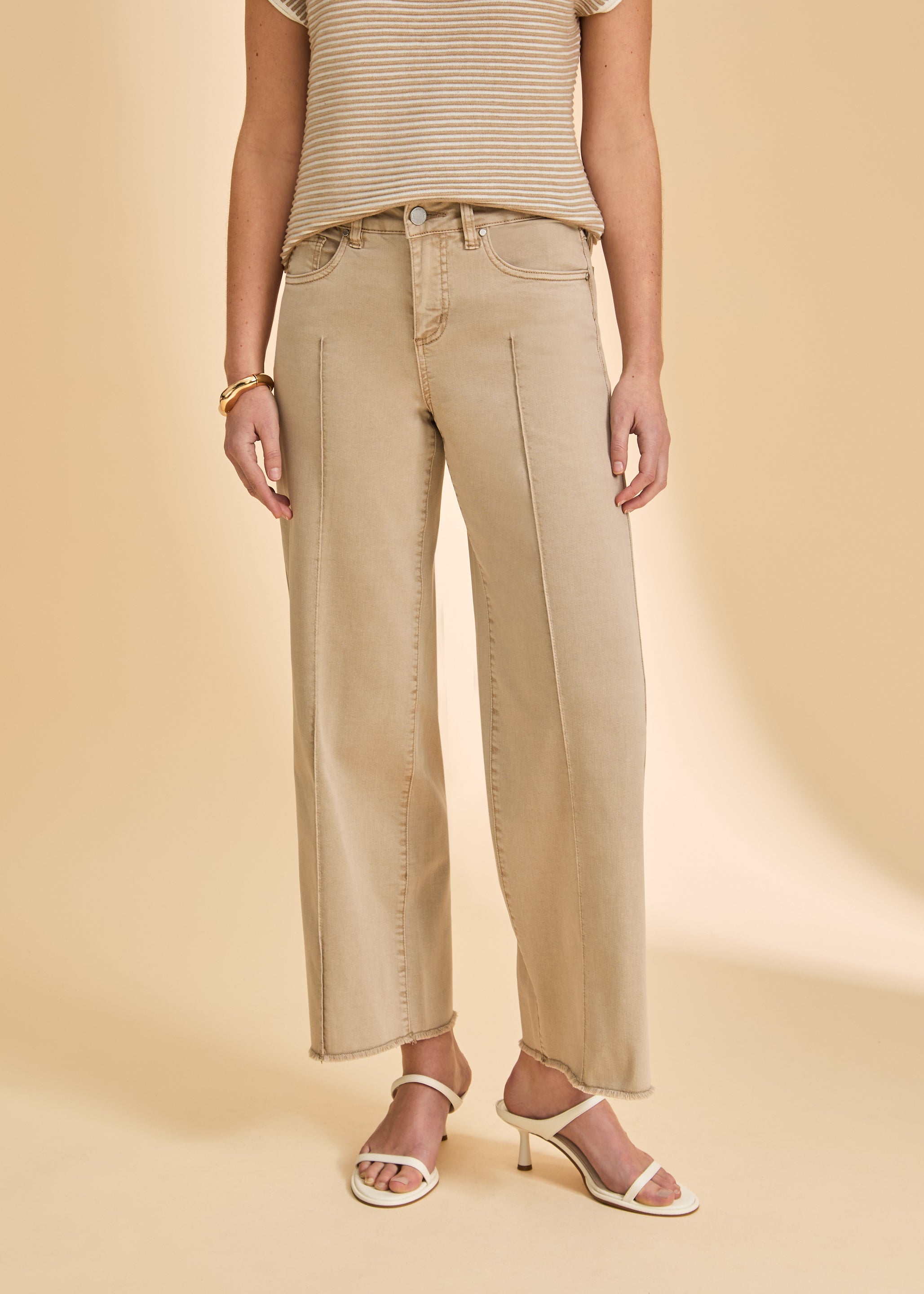 Close-up of beige wide-leg pants with front pockets by French Dressing Jeans (FDJ)