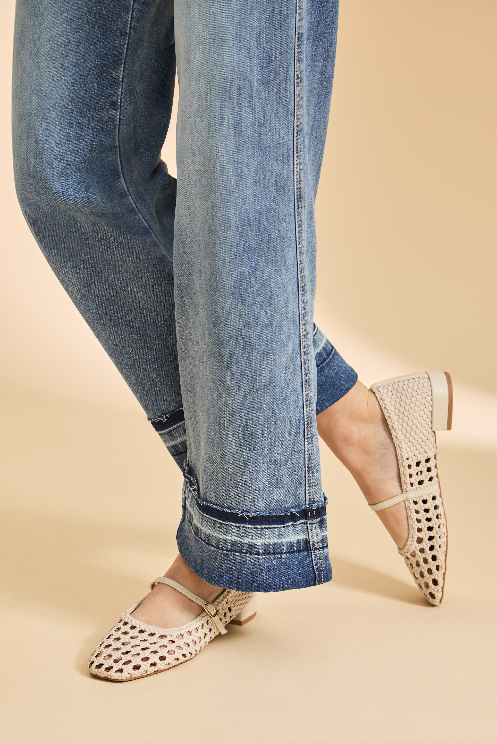 Close-up of cuffed hem detail on wide-leg denim by French Dressing Jeans (FDJ)