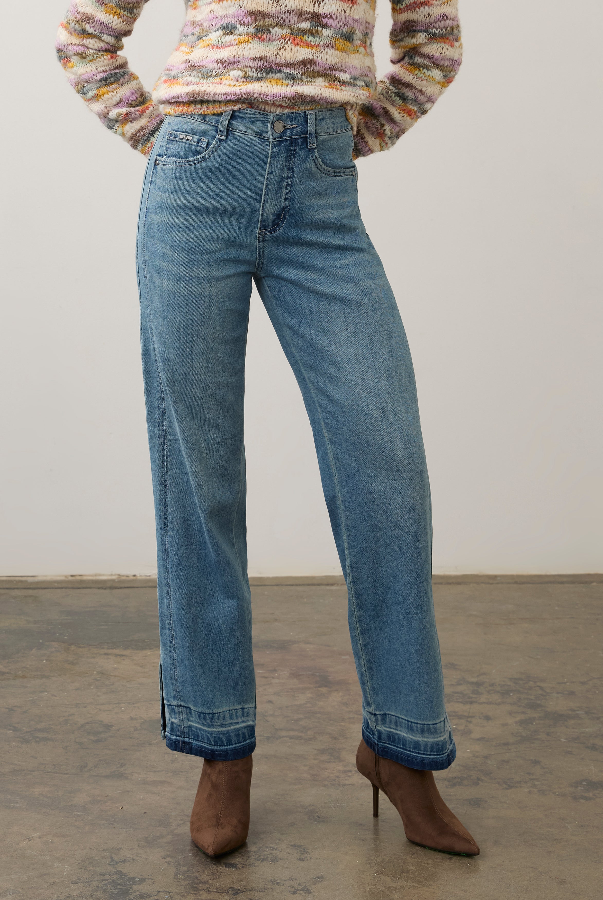 Front view of light wash denim pants showing high-rise waist and straight leg design by French Dressing Jeans (FDJ) par French Dressing Jeans (FDJ)
