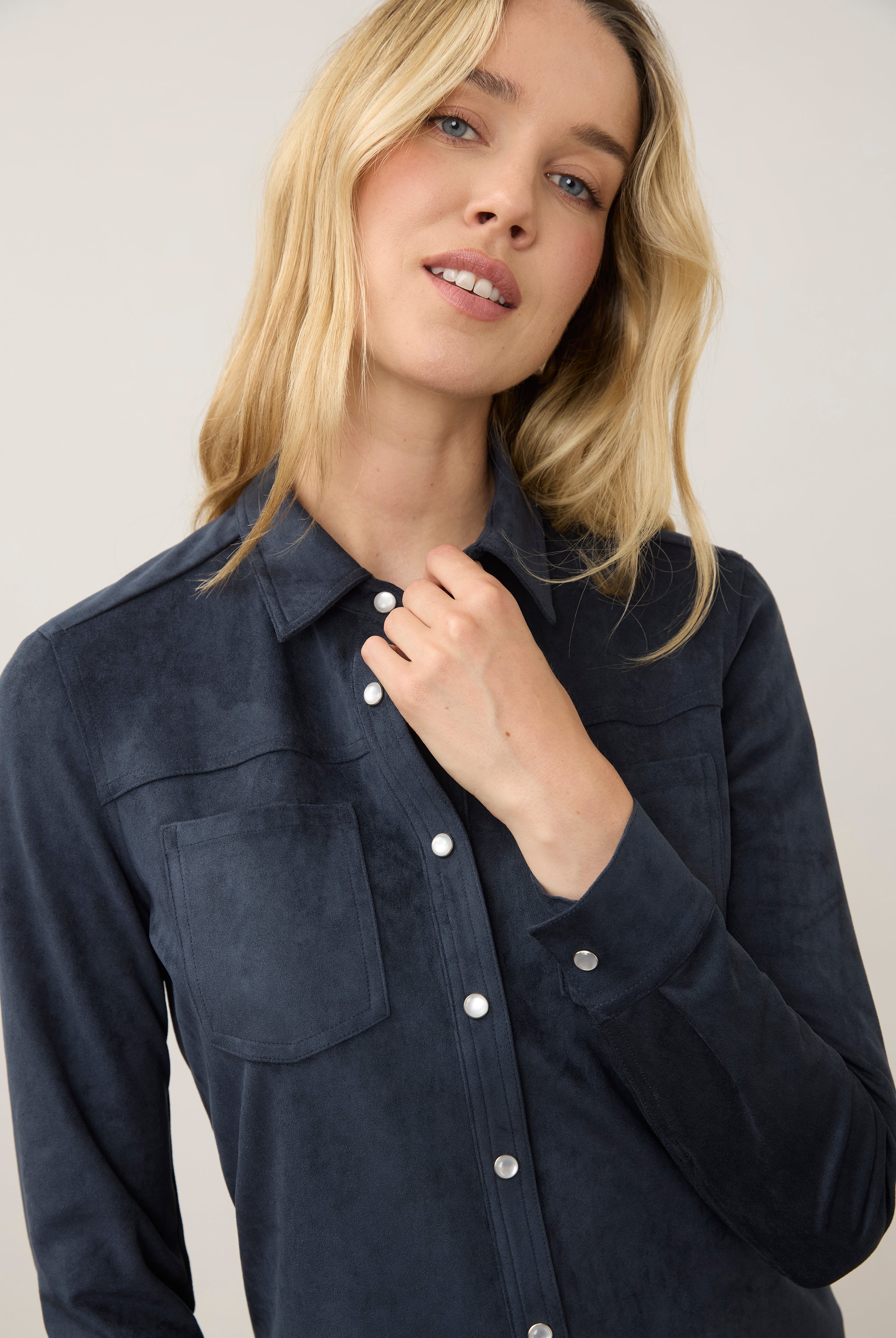 Close-up of navy suede shirt highlighting button details by French Dressing Jeans (FDJ)