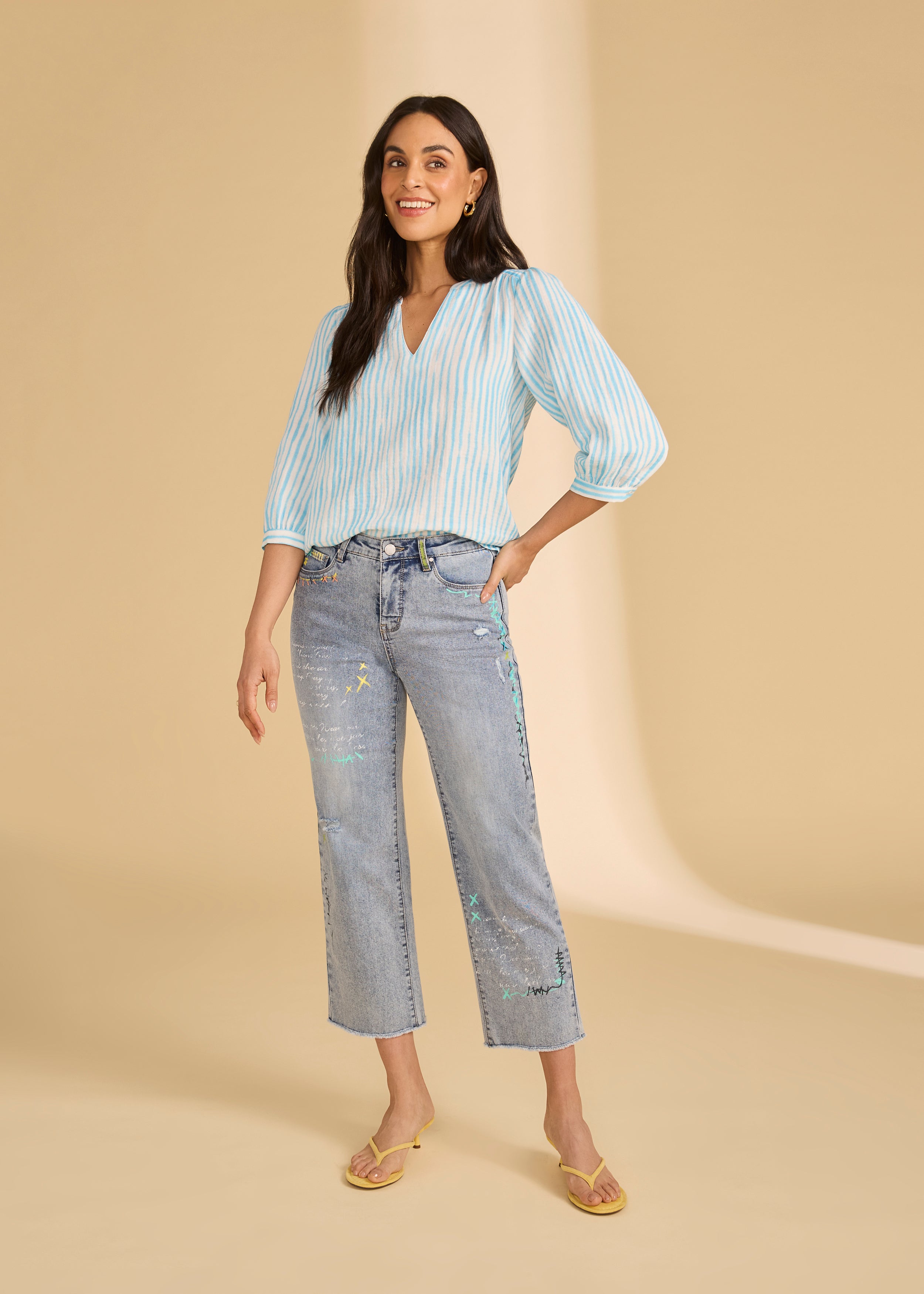 Full look of light blue striped blouse paired with jeans for a relaxed style by French Dressing Jeans (FDJ)