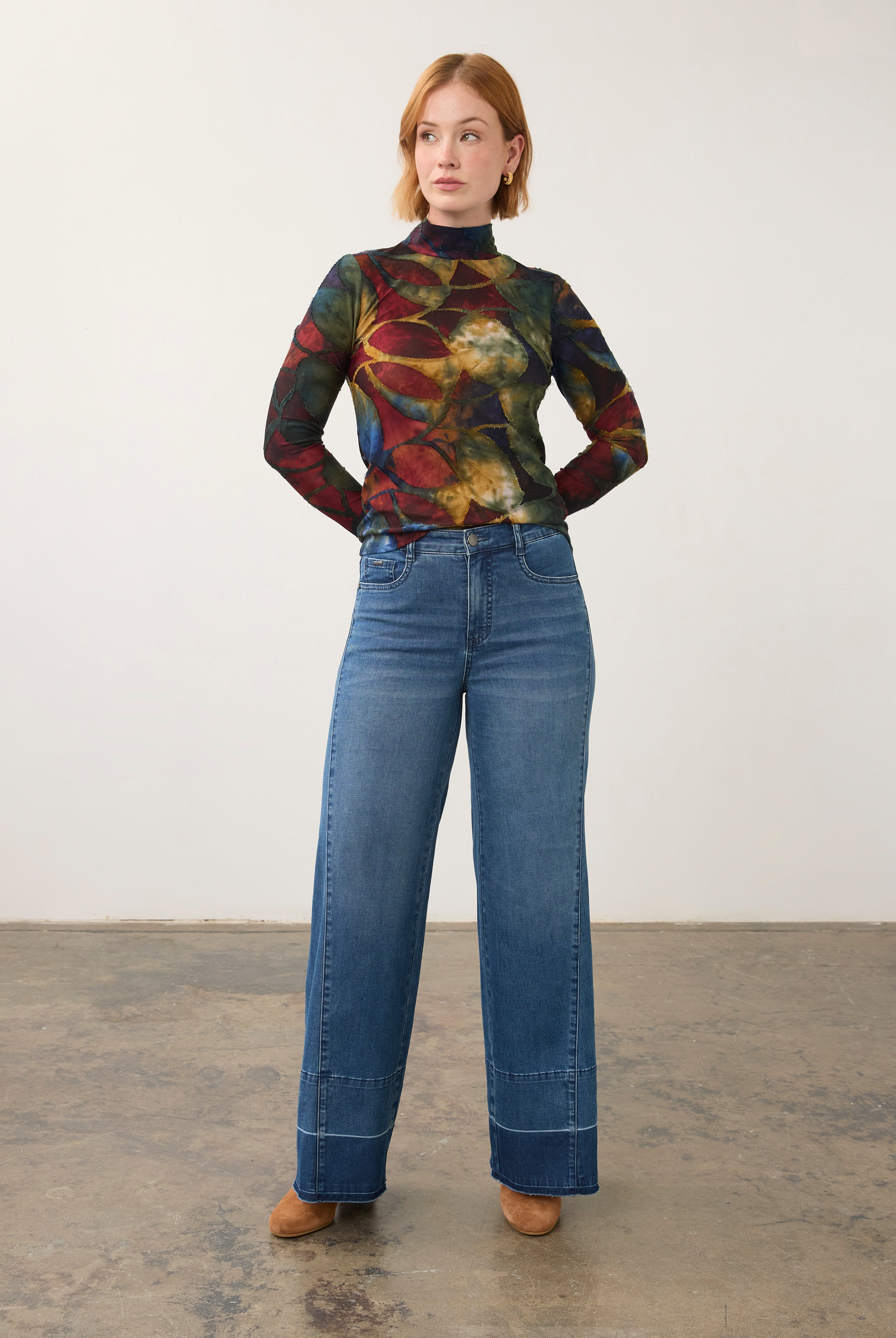 Full body view of abstract print top with denim jeans, artistic casual look by French Dressing Jeans (FDJ)