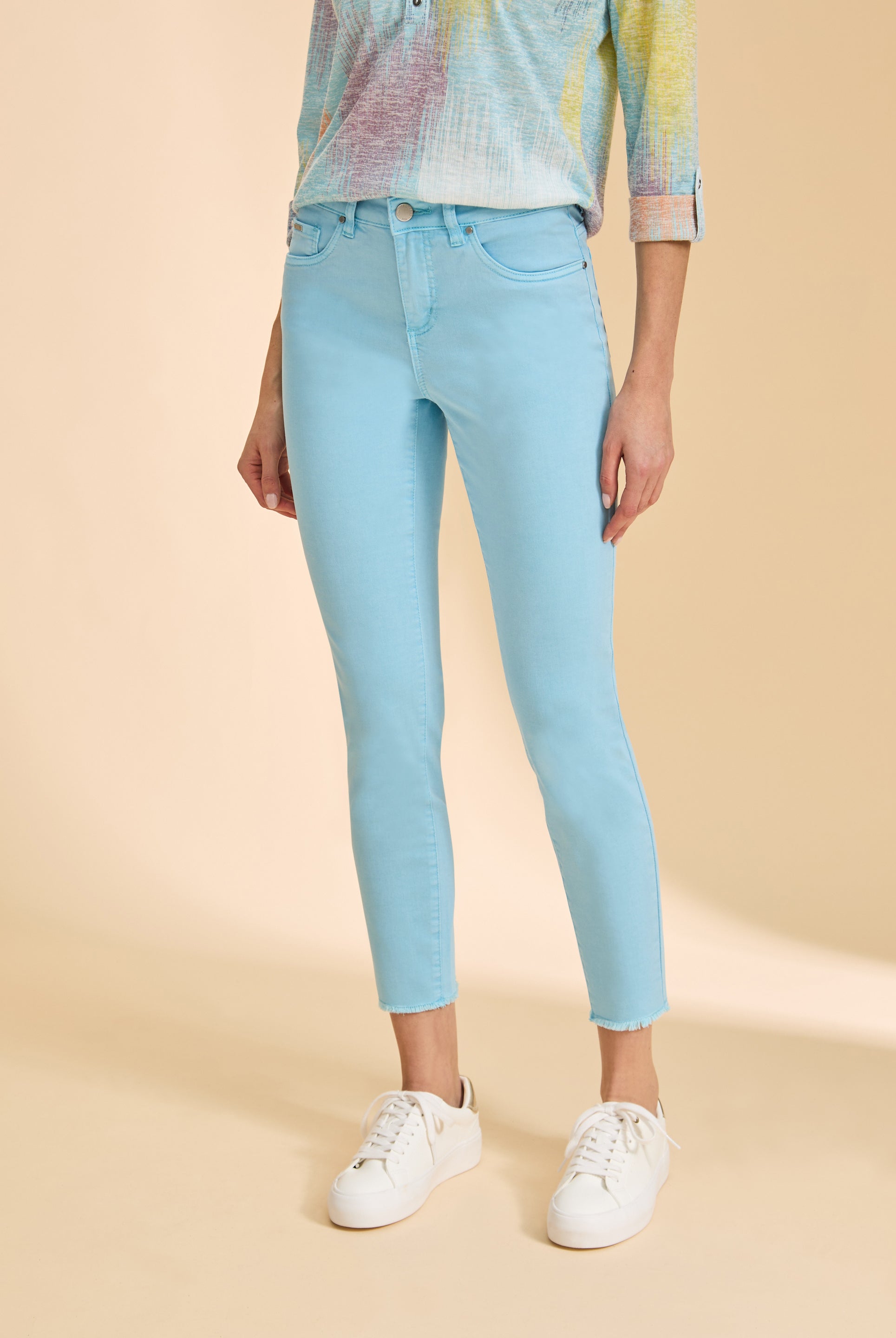 Close-up of Pacific Blue skinny pants with front pockets by French Dressing Jeans (FDJ)