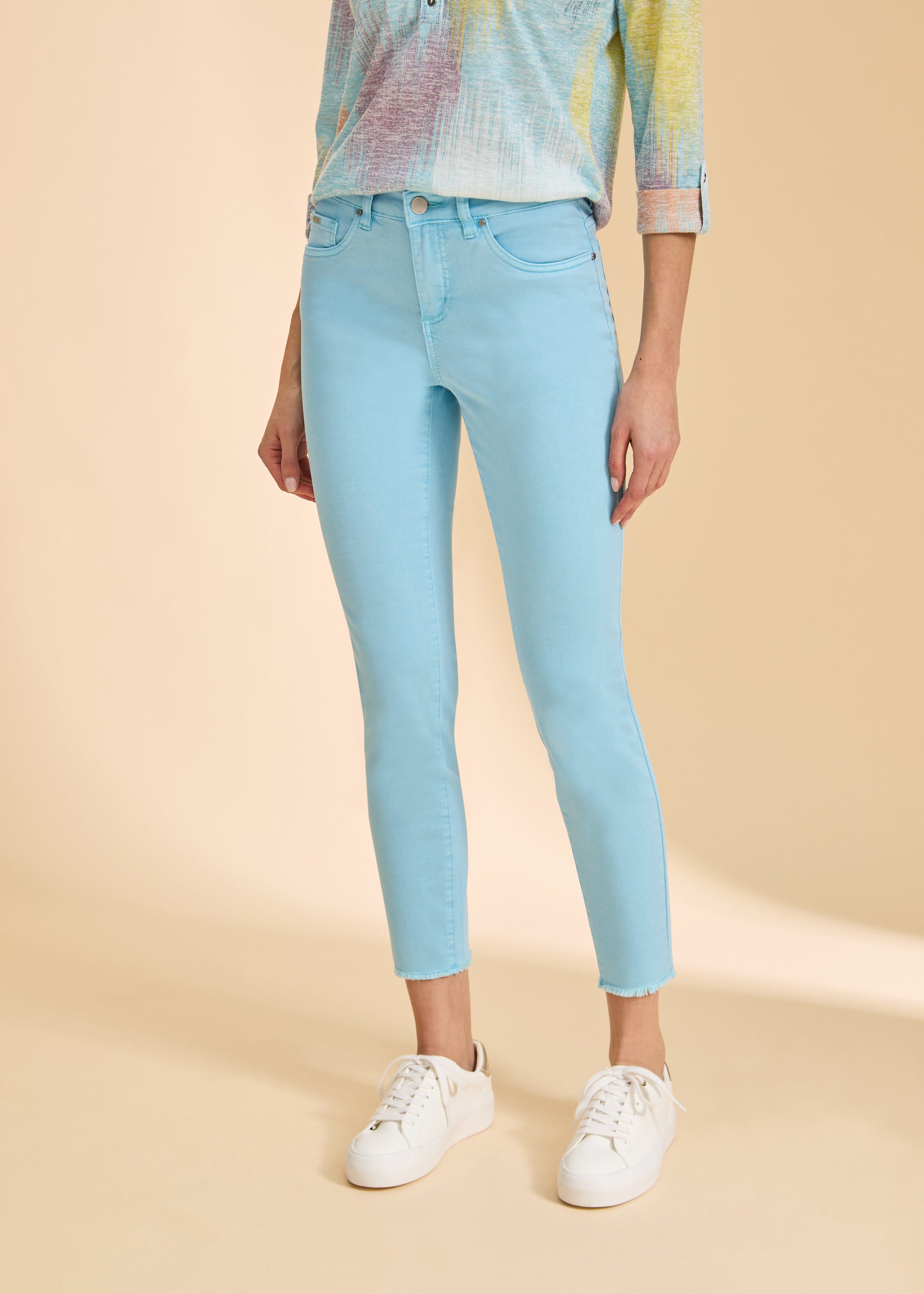 Close-up of Pacific Blue skinny pants with front pockets by French Dressing Jeans (FDJ)
