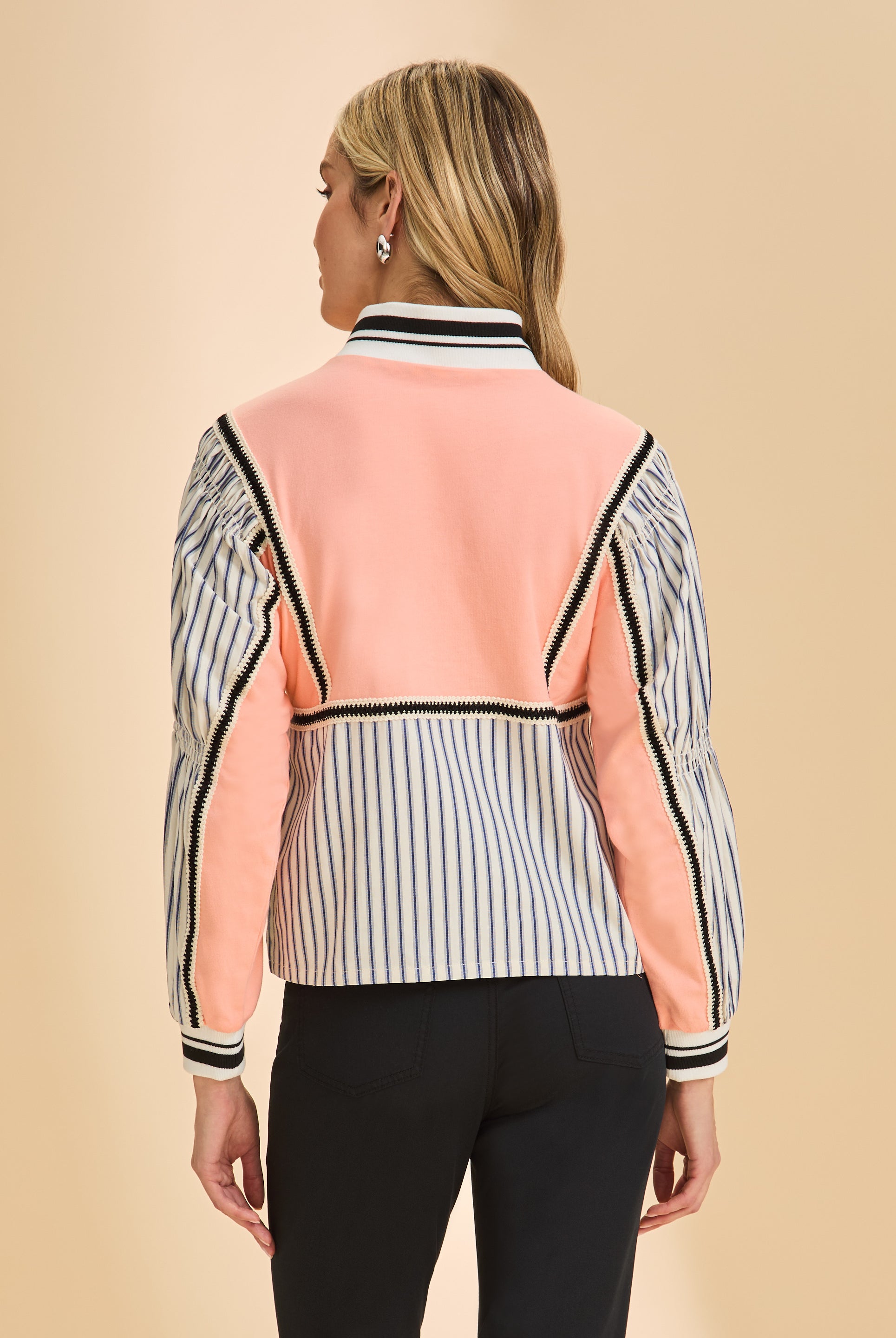 Back view of cantaloupe top showing striped sleeves and contrast trim details by French Dressing Jeans (FDJ)